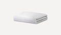 white bedding with a white background