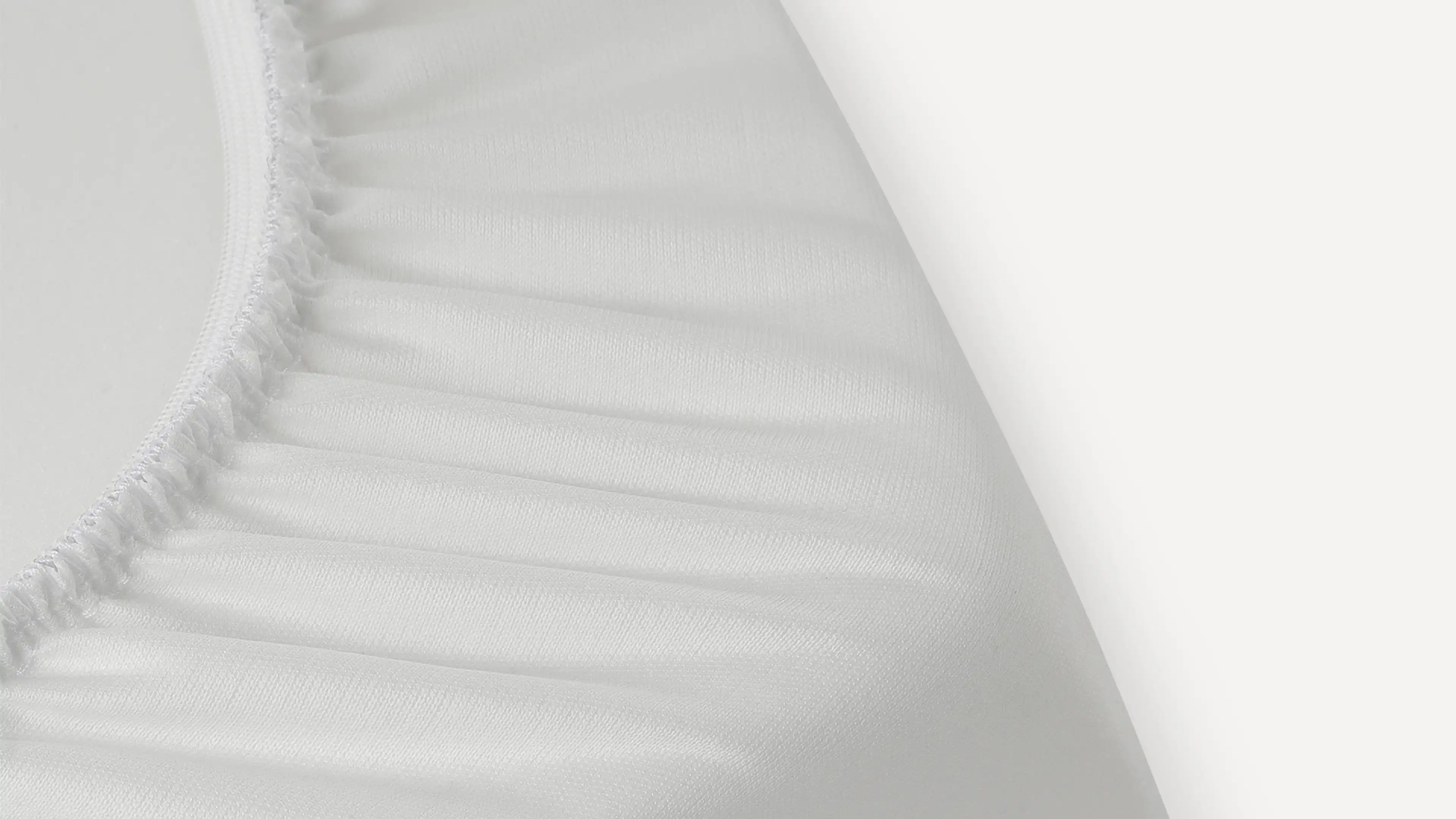 a white pillow with fray edges and fray edges