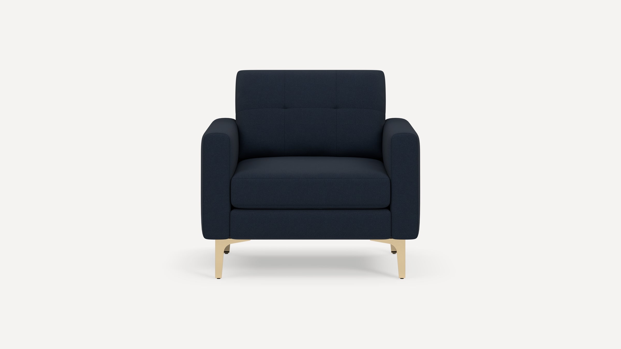 Front view of a modern navy blue armchair with square armrests and light wooden legs on a plain white background.