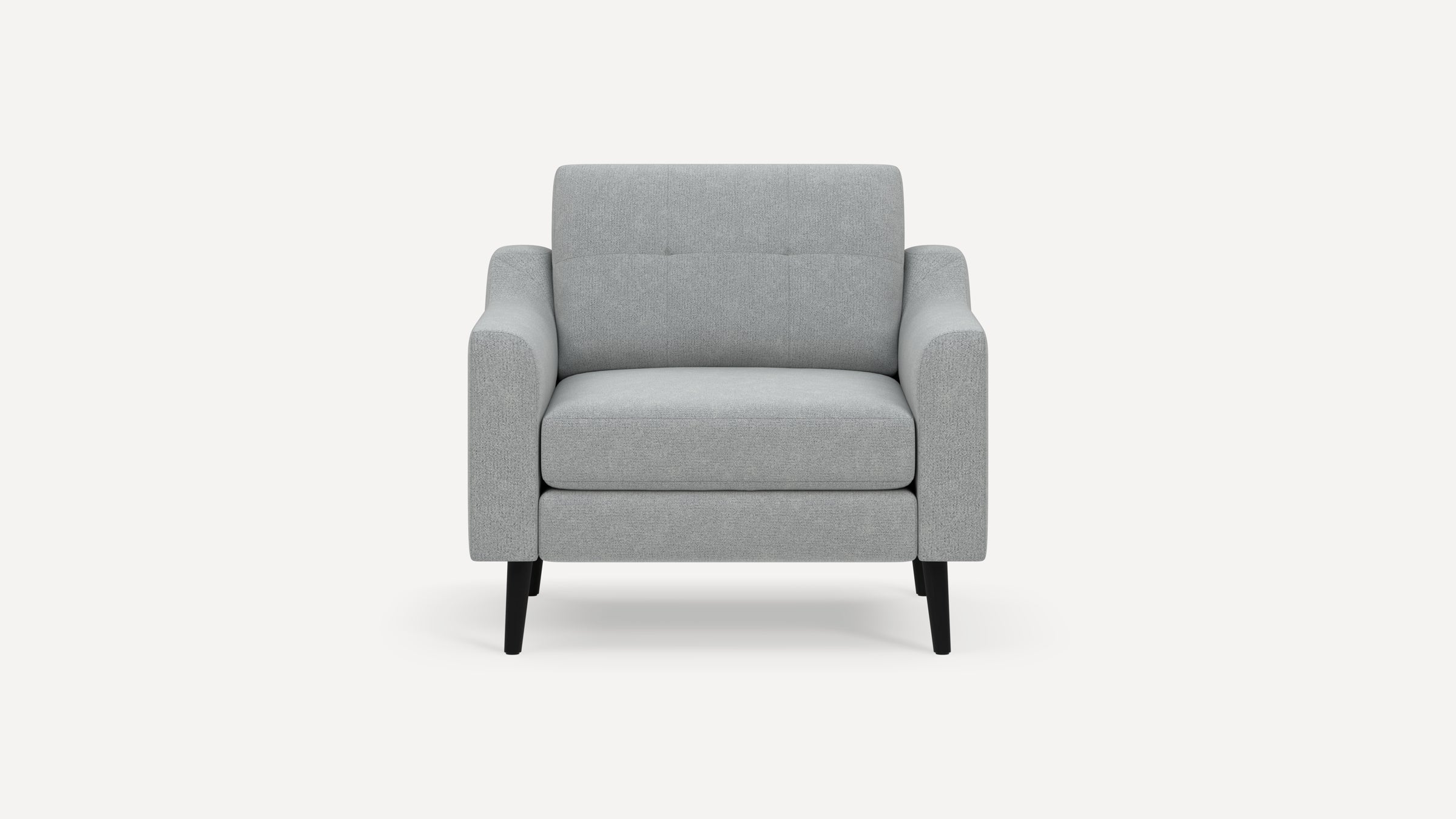 Front view of a modern light gray upholstered armchair with square arms and black tapered wooden legs.