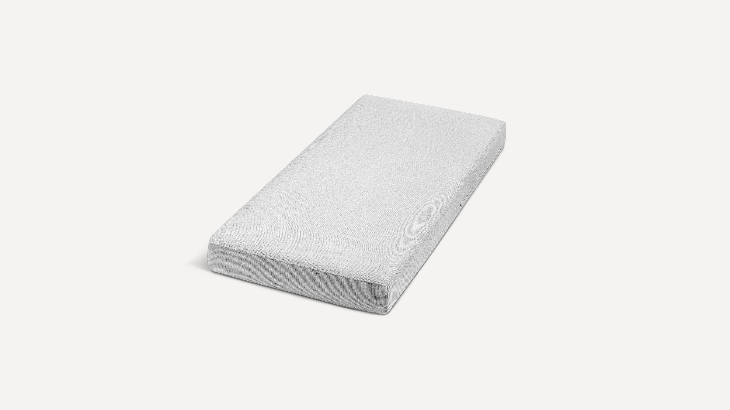 a white pillow on a white background