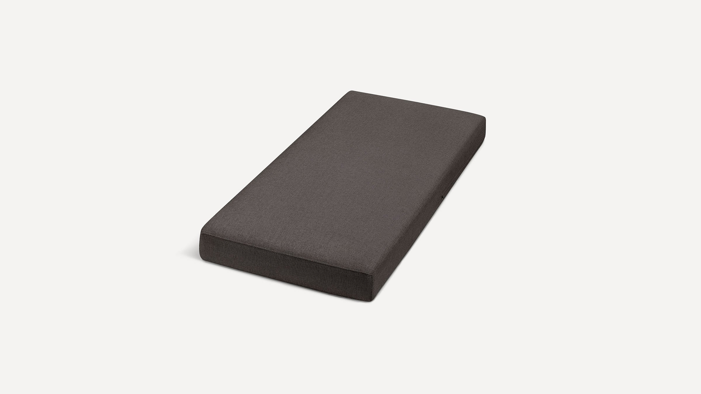 dark gray cushion on white background