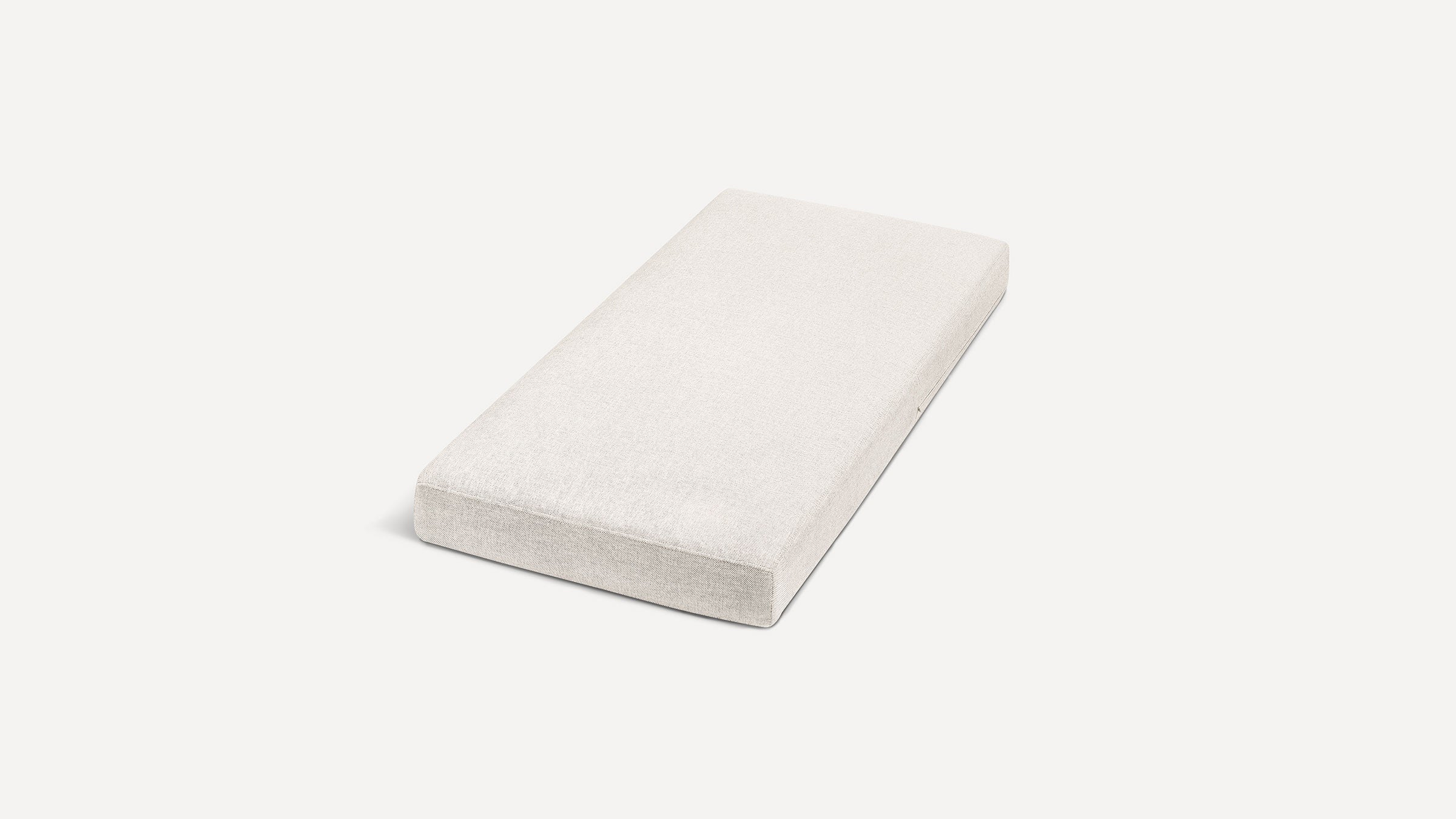 a white pillow on a white background