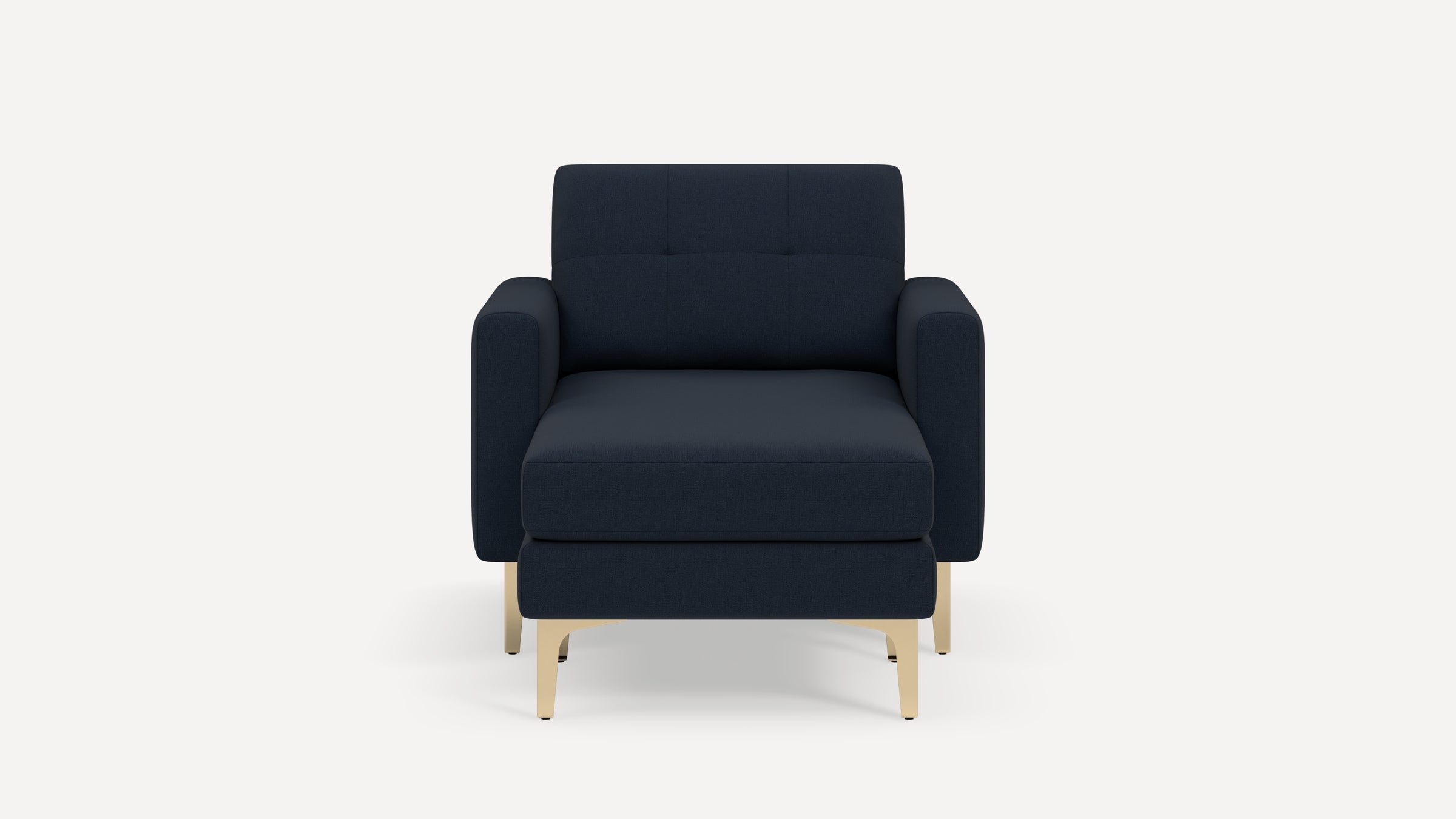 Front view of a modern navy blue upholstered armchair with light wooden legs against a white background.