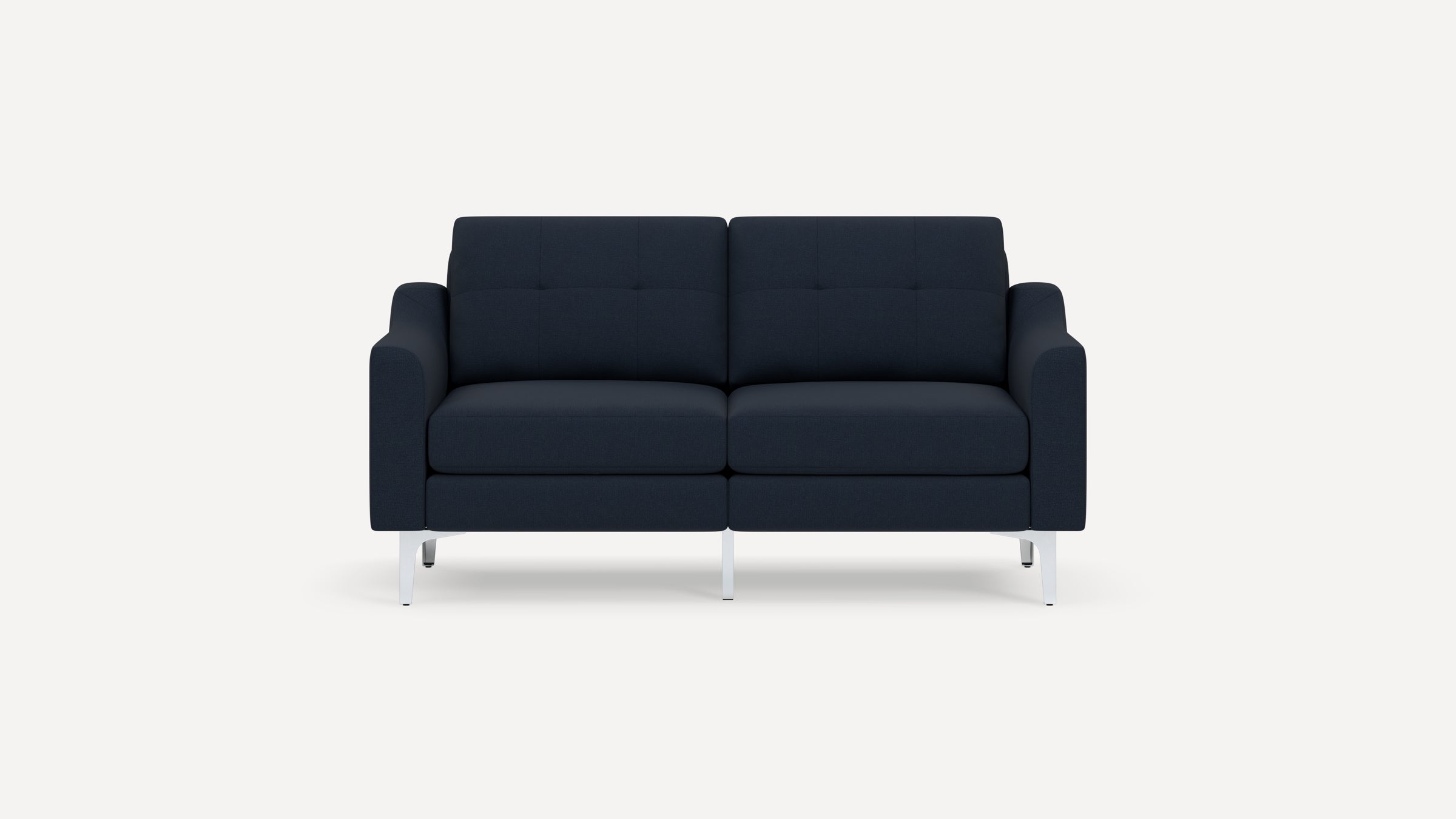 Modern two-seater navy blue fabric sofa with tufted back cushions and sleek white metal legs on a plain white background.