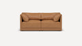 Front view of a modern, tan leather two-seater sofa with plush cushions and low armrests on a white background.