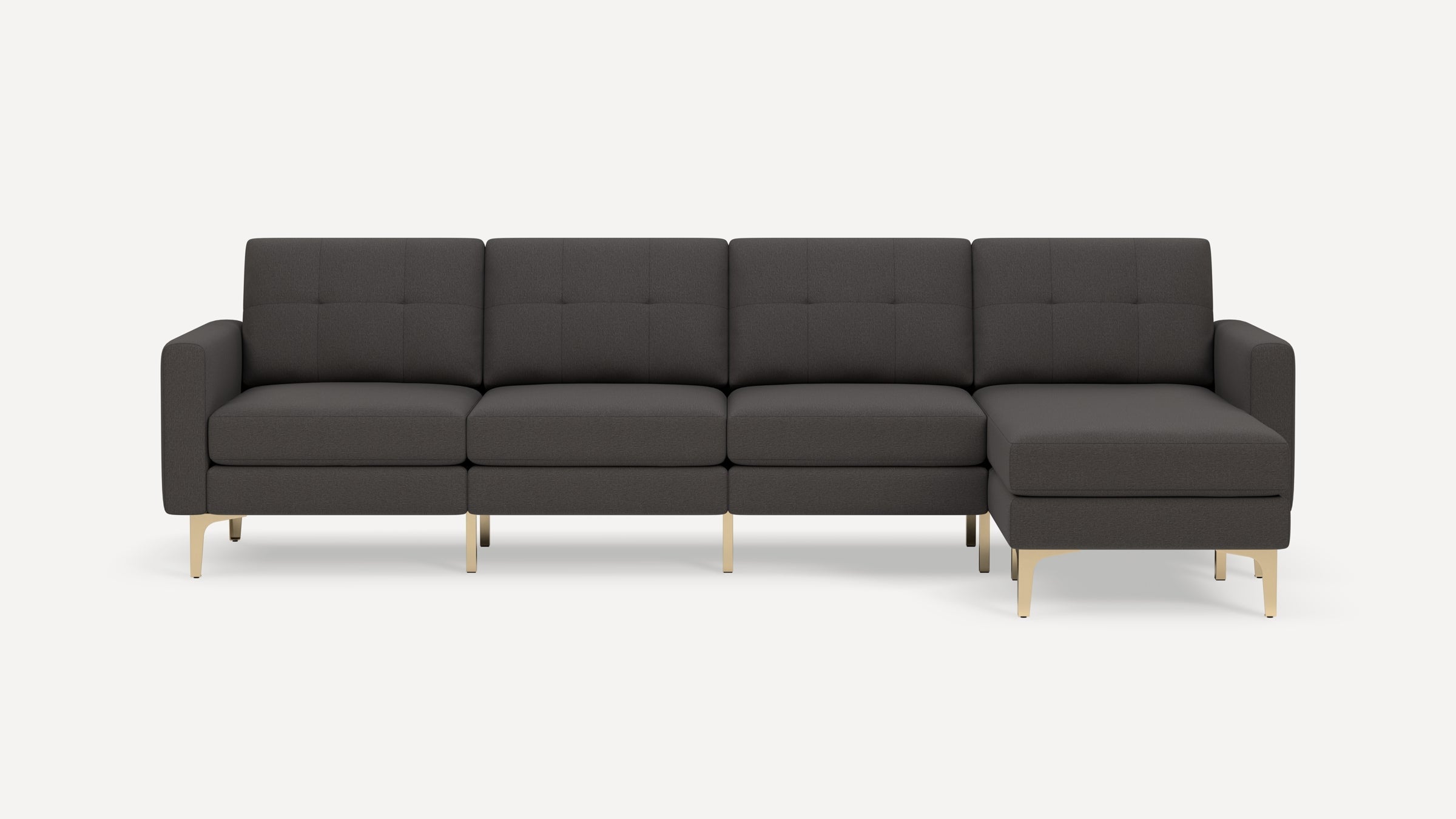 Modern dark gray sectional sofa with tufted back cushions and gold metal legs, featuring a right-side chaise lounge.