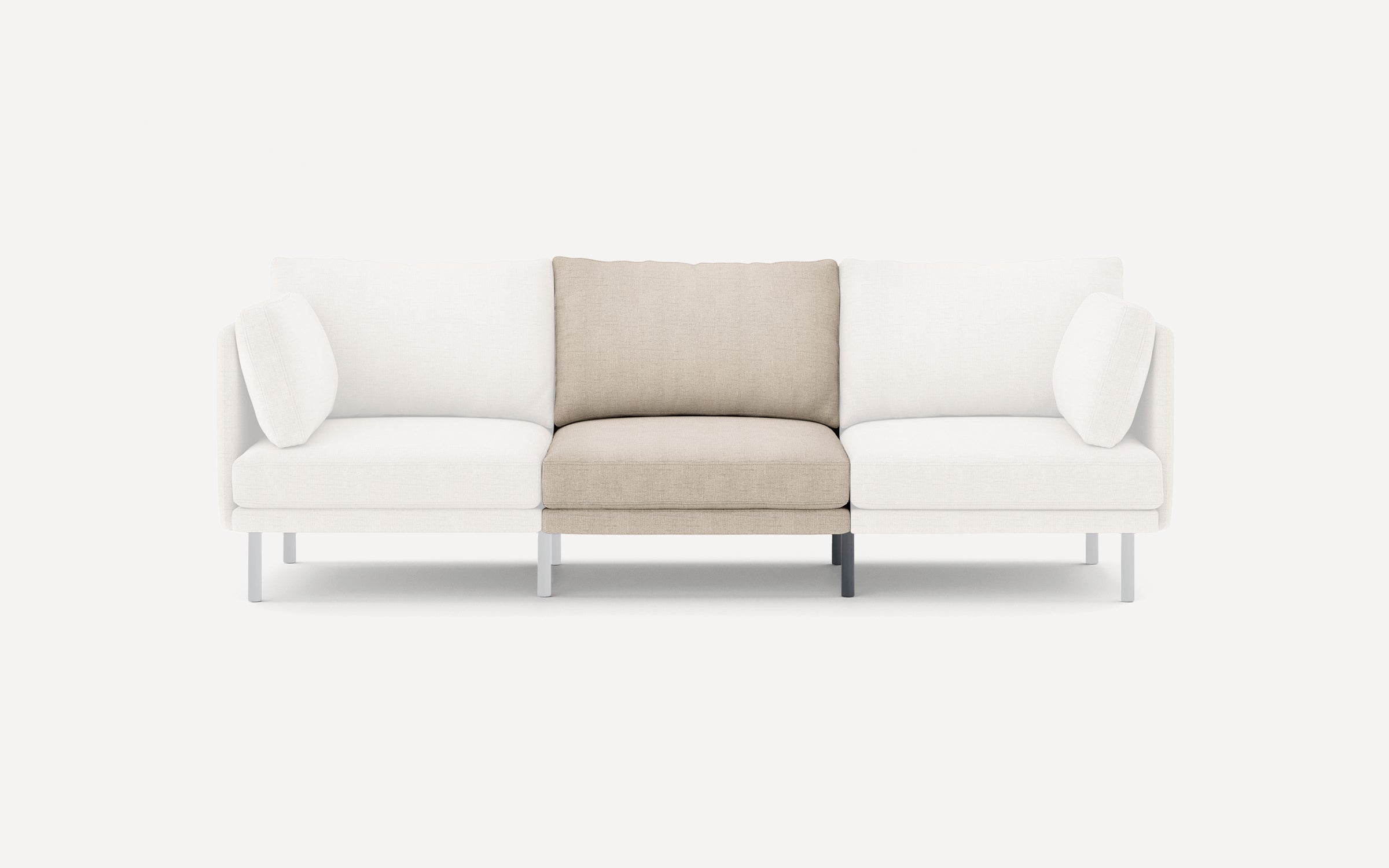 Modern three-seater sofa with beige center cushion and white cushions on both ends, featuring simple metal legs.