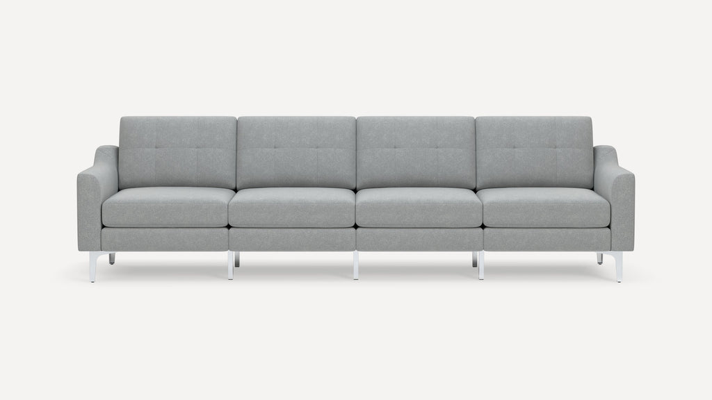 Modern four-seat gray fabric sofa with tufted cushions and metal legs, featuring padded armrests and a minimalist design.