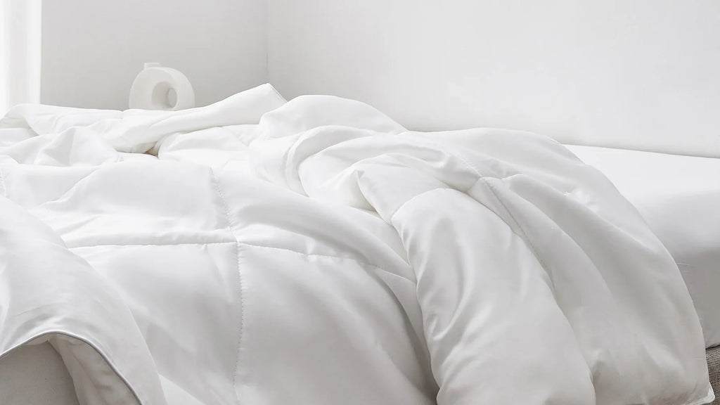 white comforter on bed