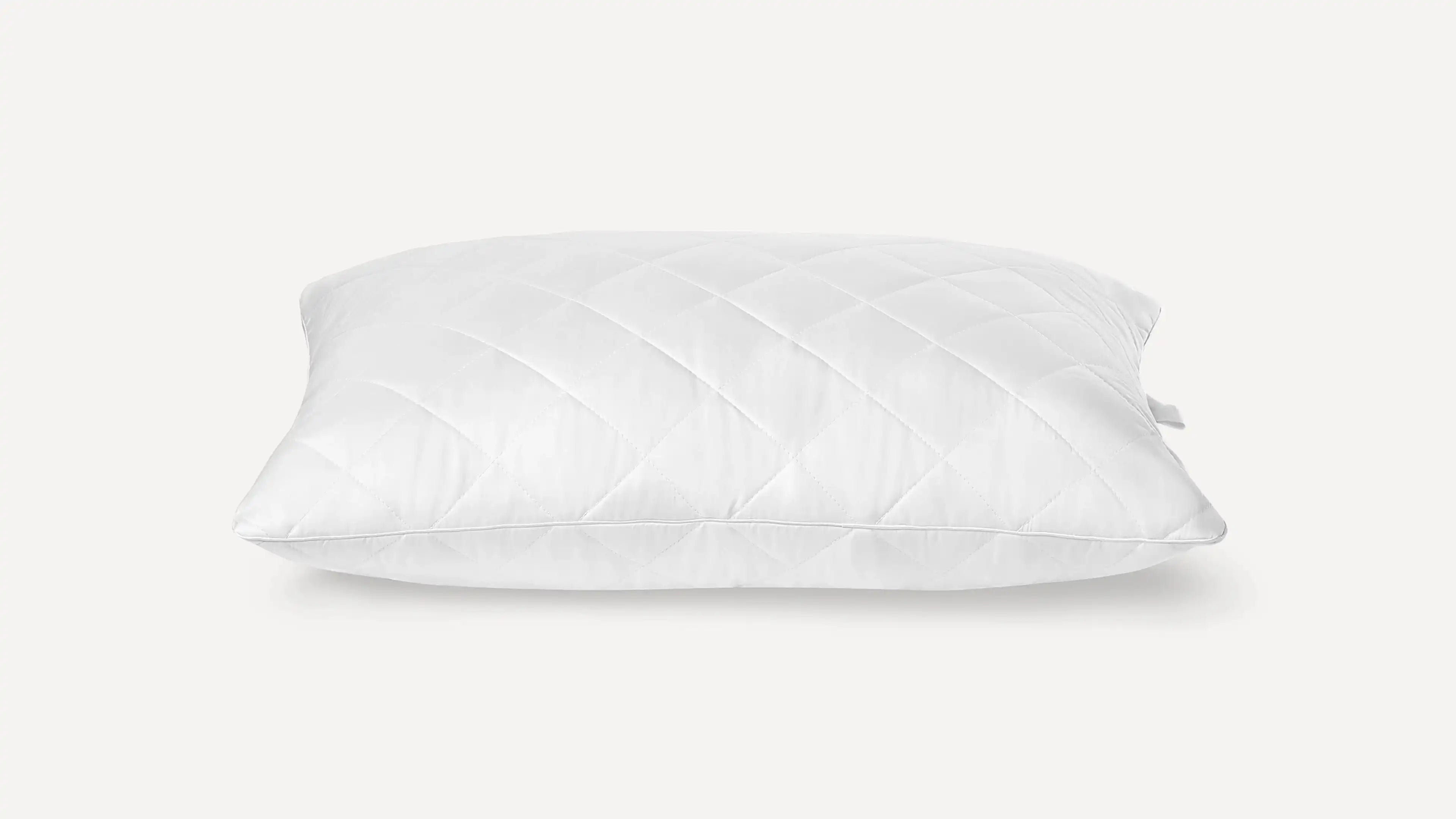a white pillow on a white background