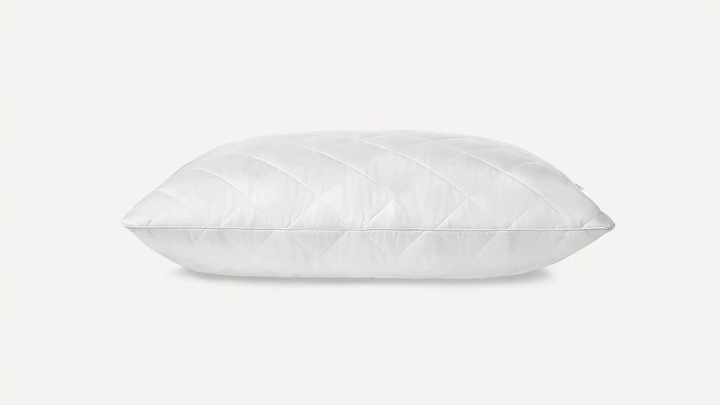 a white pillow on a white background