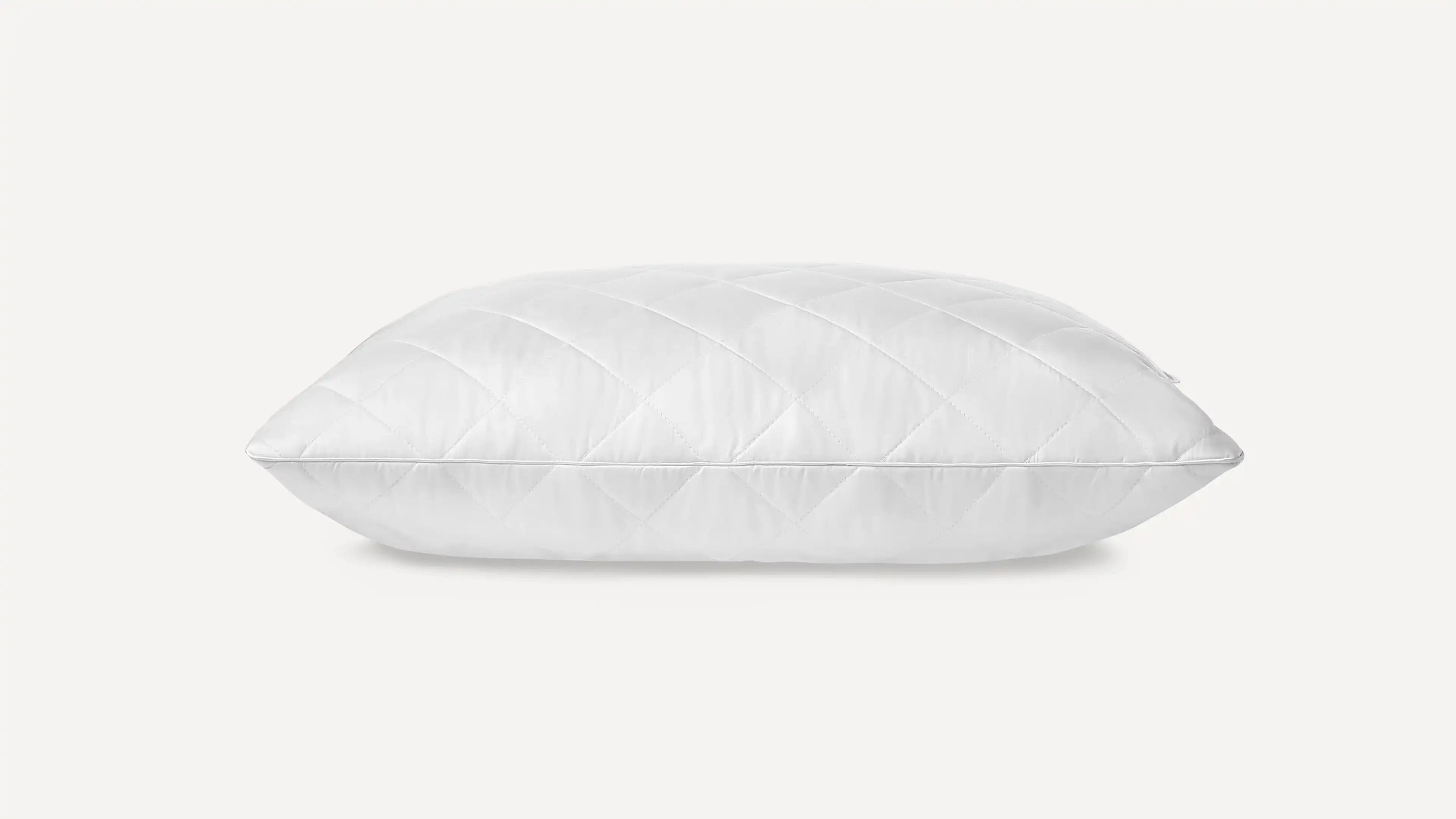 a white pillow on a white background