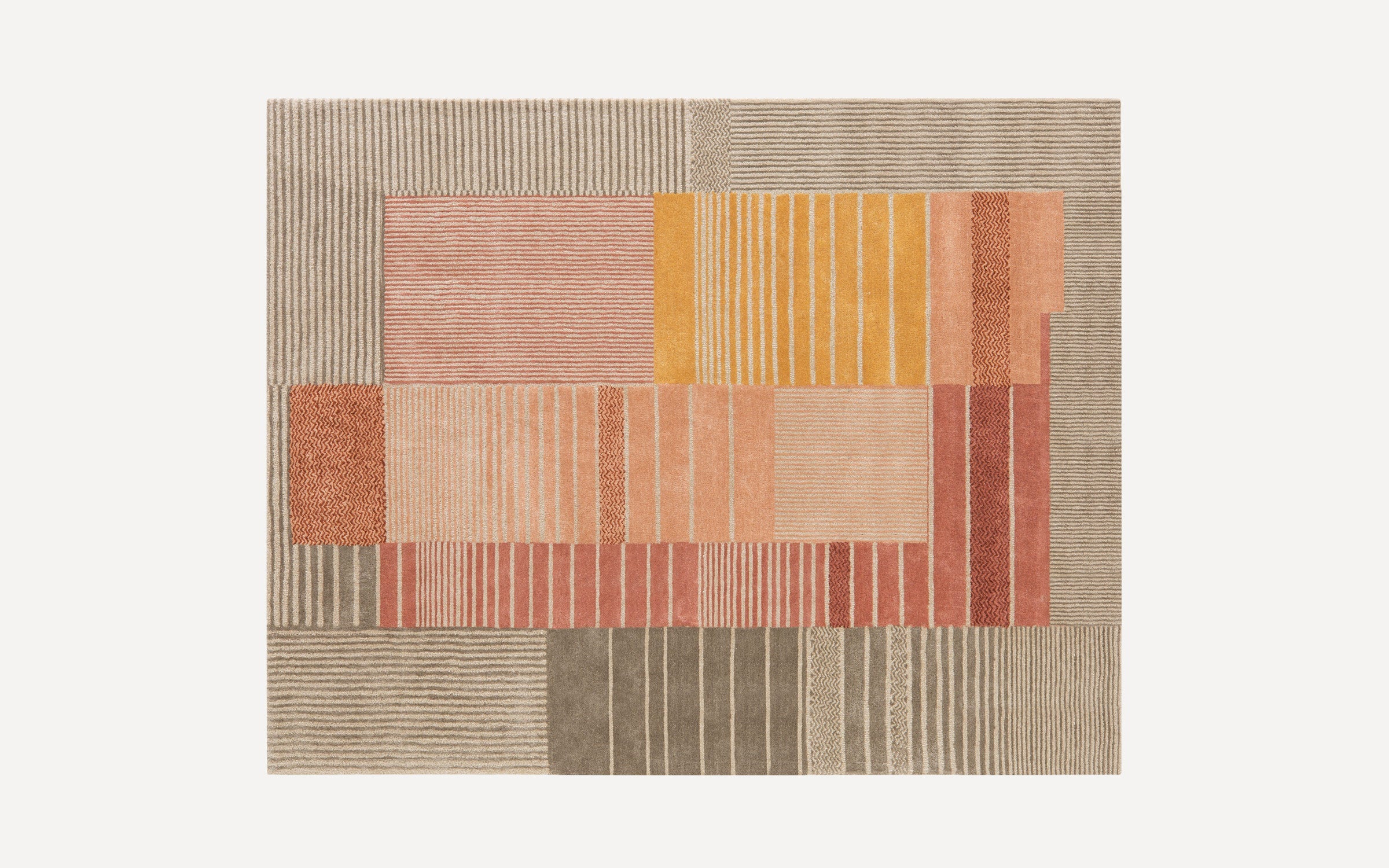 Rectangular rug with a geometric patchwork pattern in muted tones of beige, orange, yellow, and red featuring various striped designs.