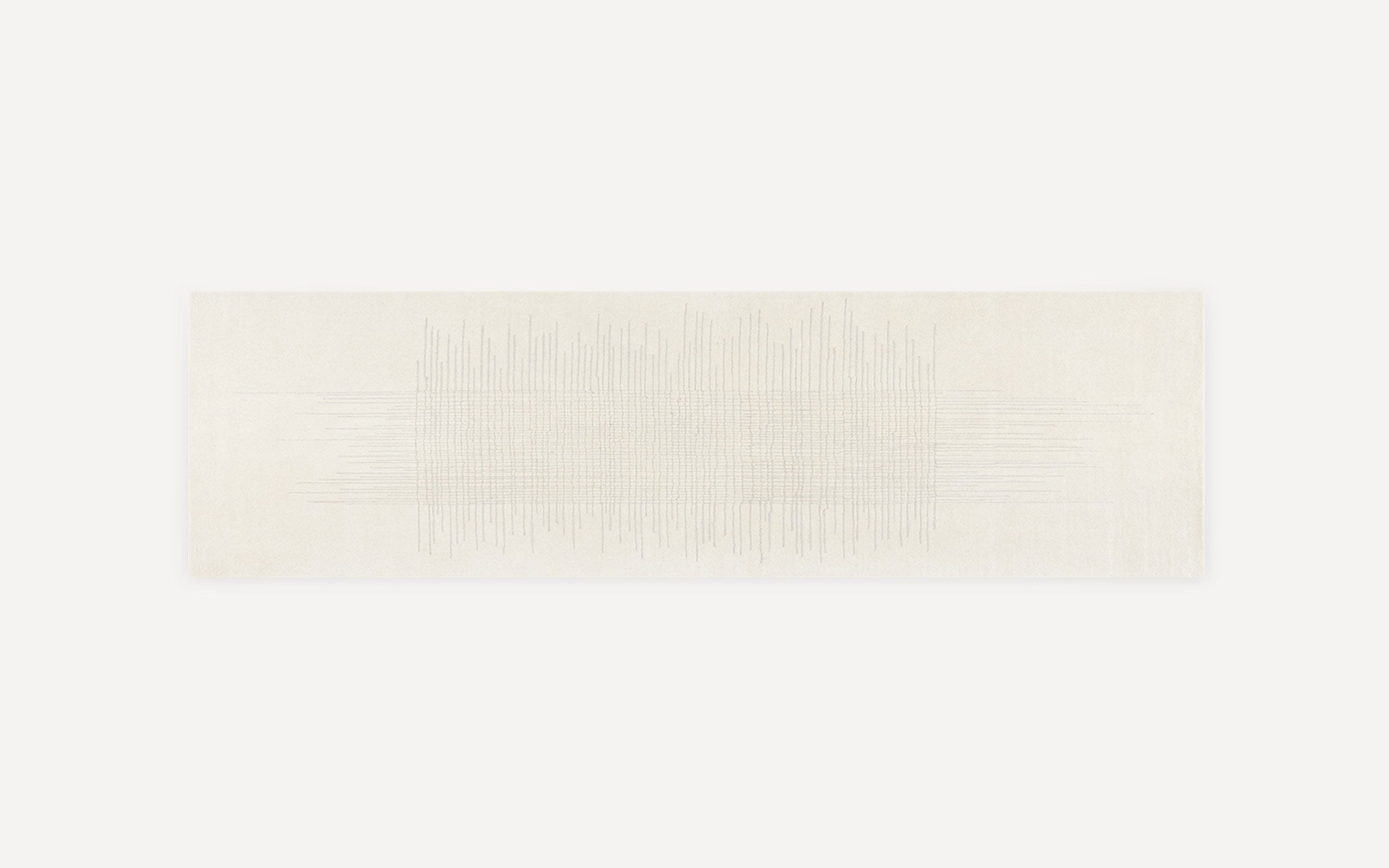 Long rectangular beige rug with a subtle, textured pattern of vertical and horizontal lines in the center.