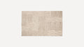 Beige rectangular rug with a textured geometric pattern combining vertical lines and irregular horizontal dashes in a modern design.
