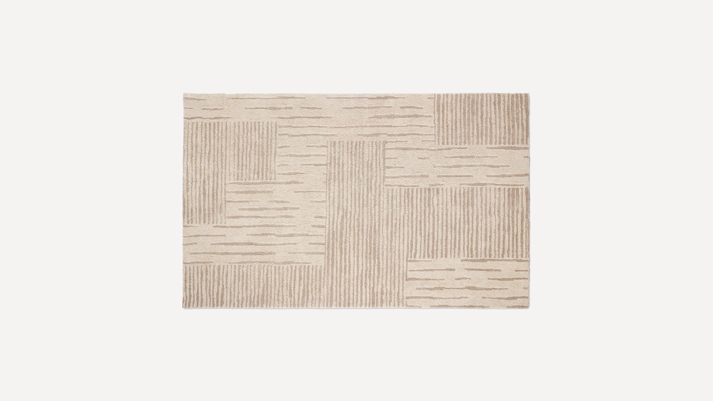 Beige rectangular rug with a textured geometric pattern combining vertical lines and irregular horizontal dashes in a modern design.