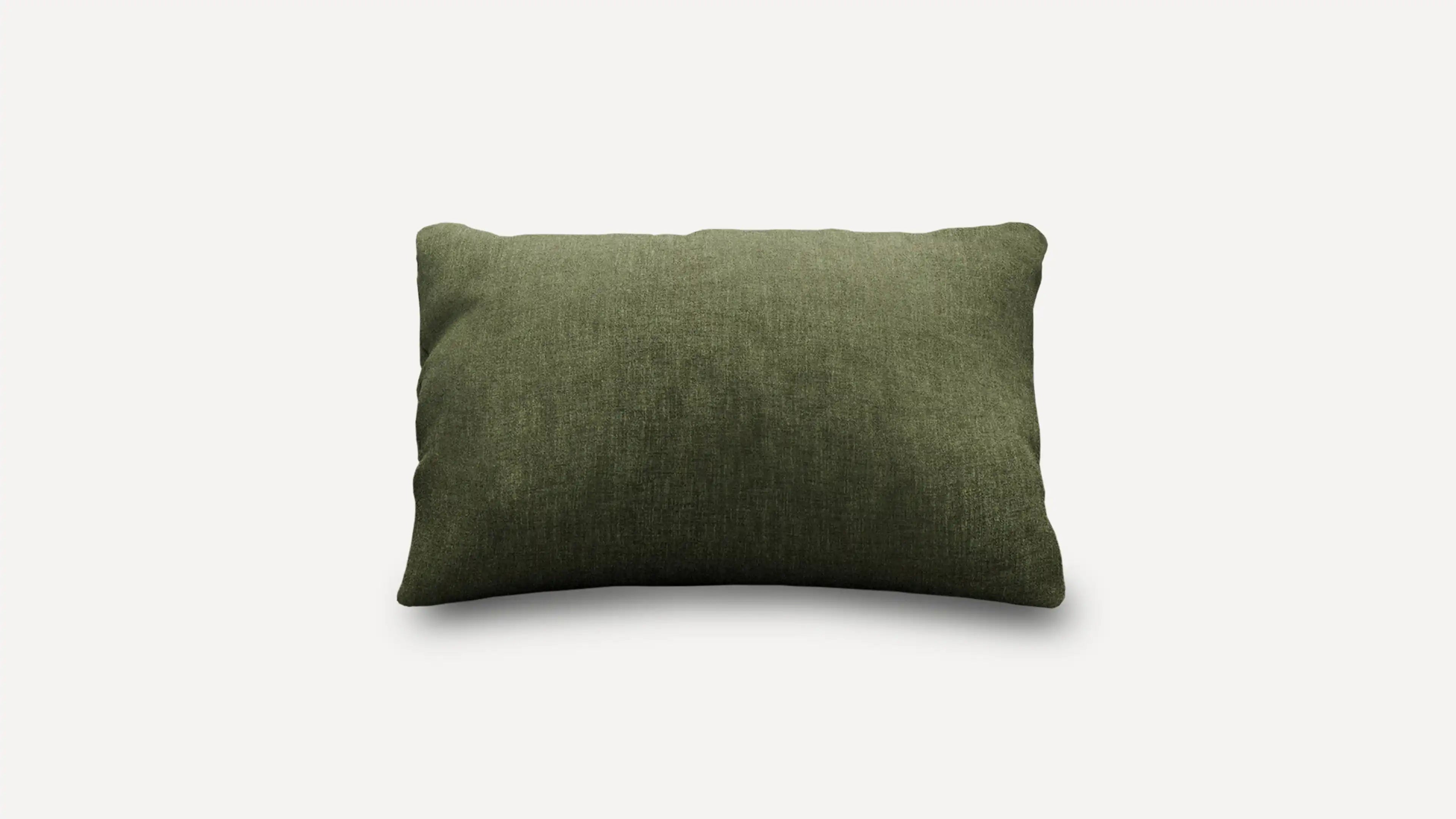 a green cushion with a white background