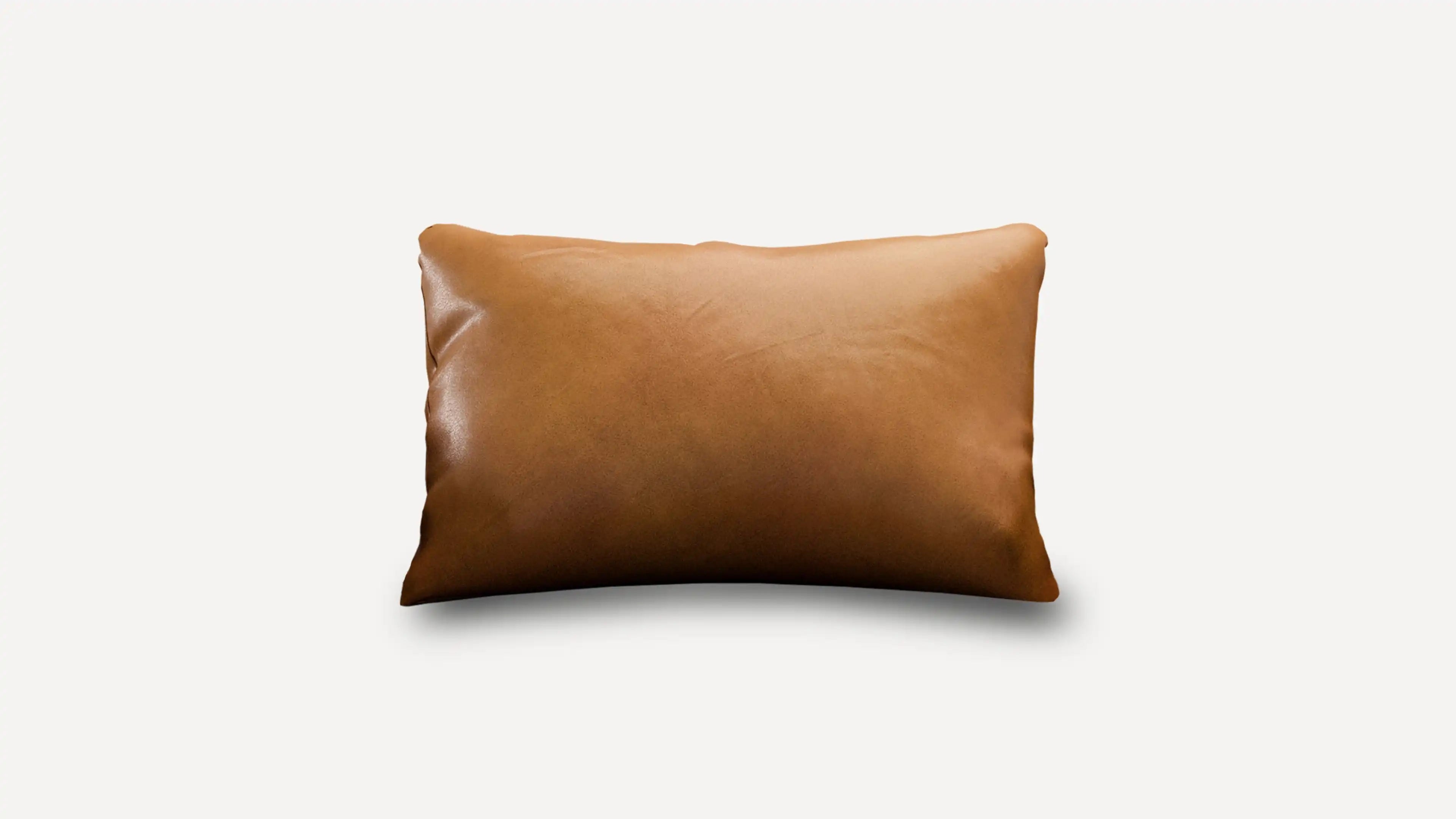 brown leather pillow on white background
