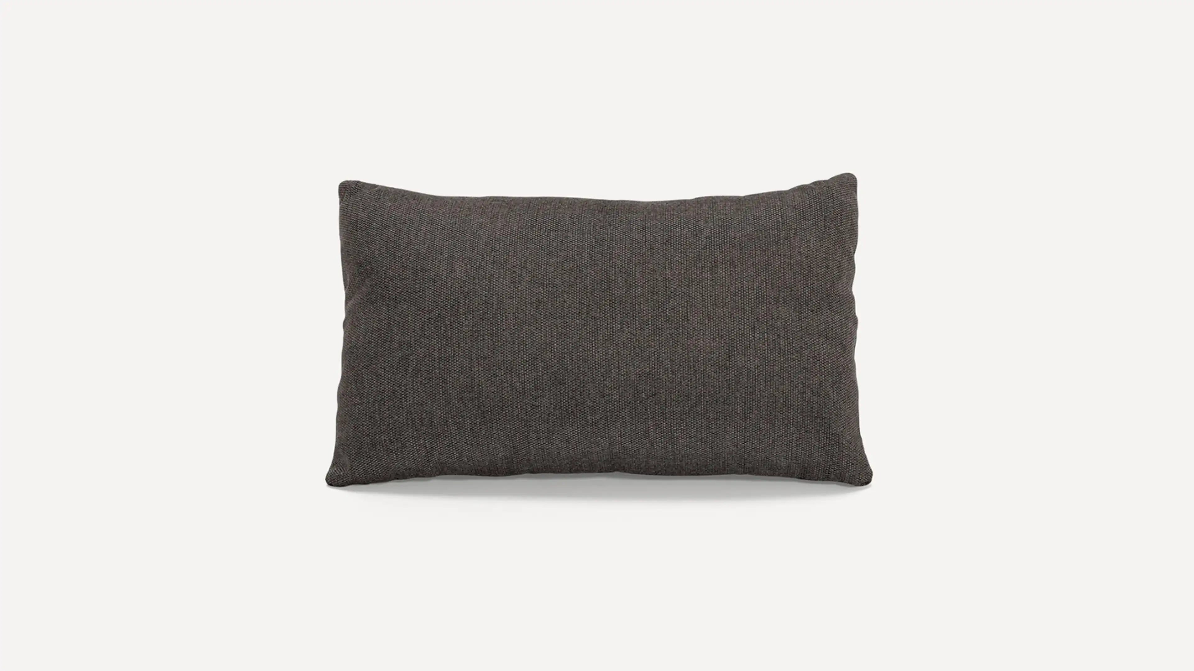 a dark gray pillow with a thin, textured design on the front