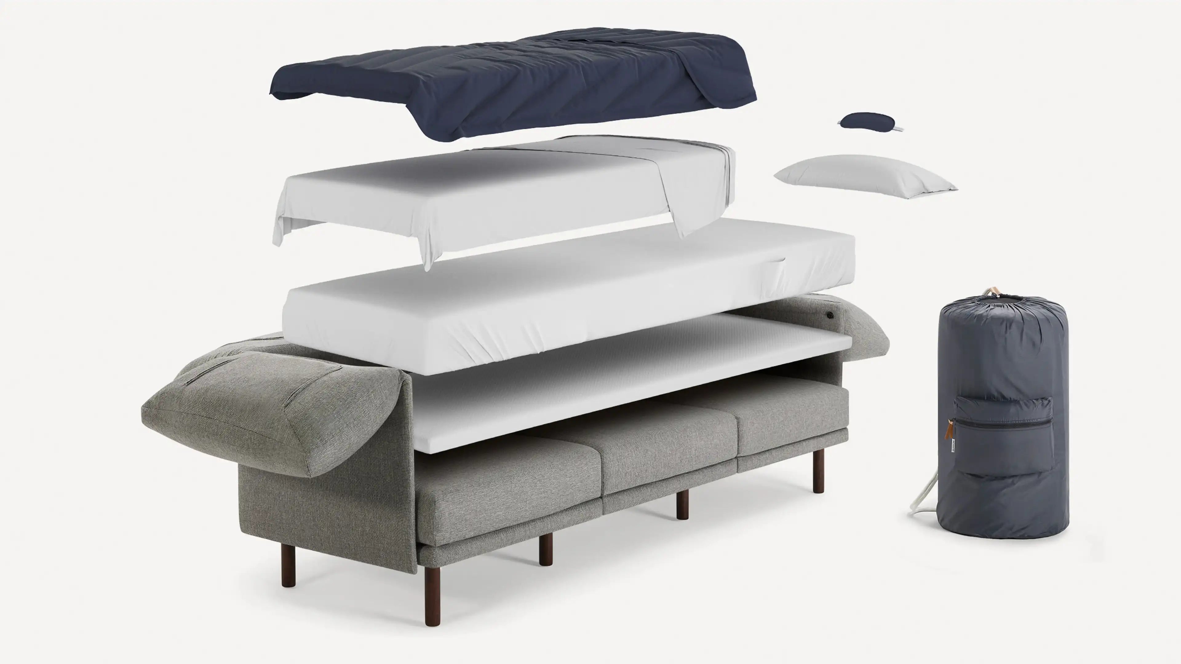 modern sofa with multiple layers of fabric and wooden legs, including a pull - out bed, a sleeping bag, and a pair of pillows