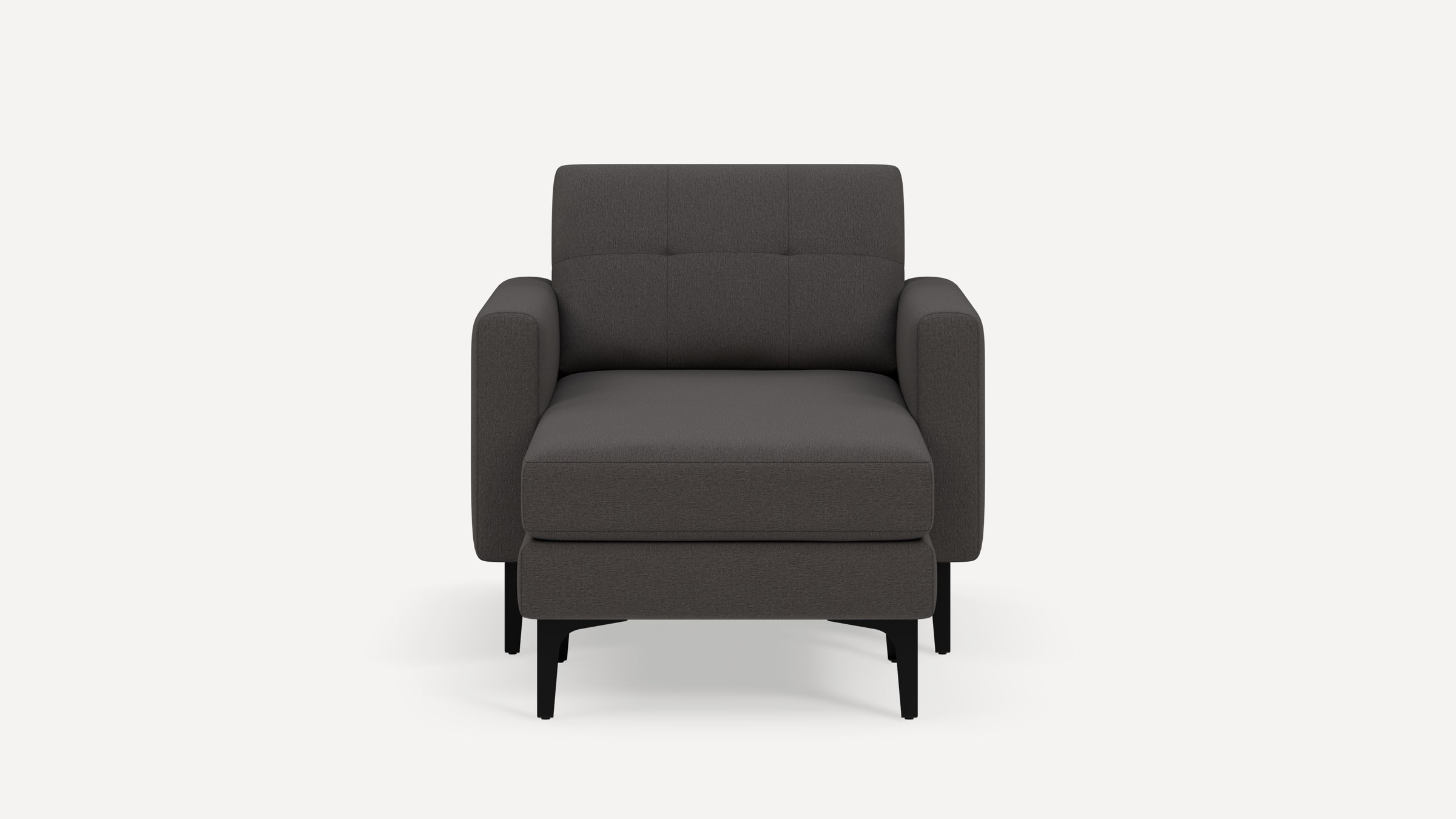 Dark gray modern armchair with cushioned seat and backrest, featuring black slim legs and a clean, minimalist design.