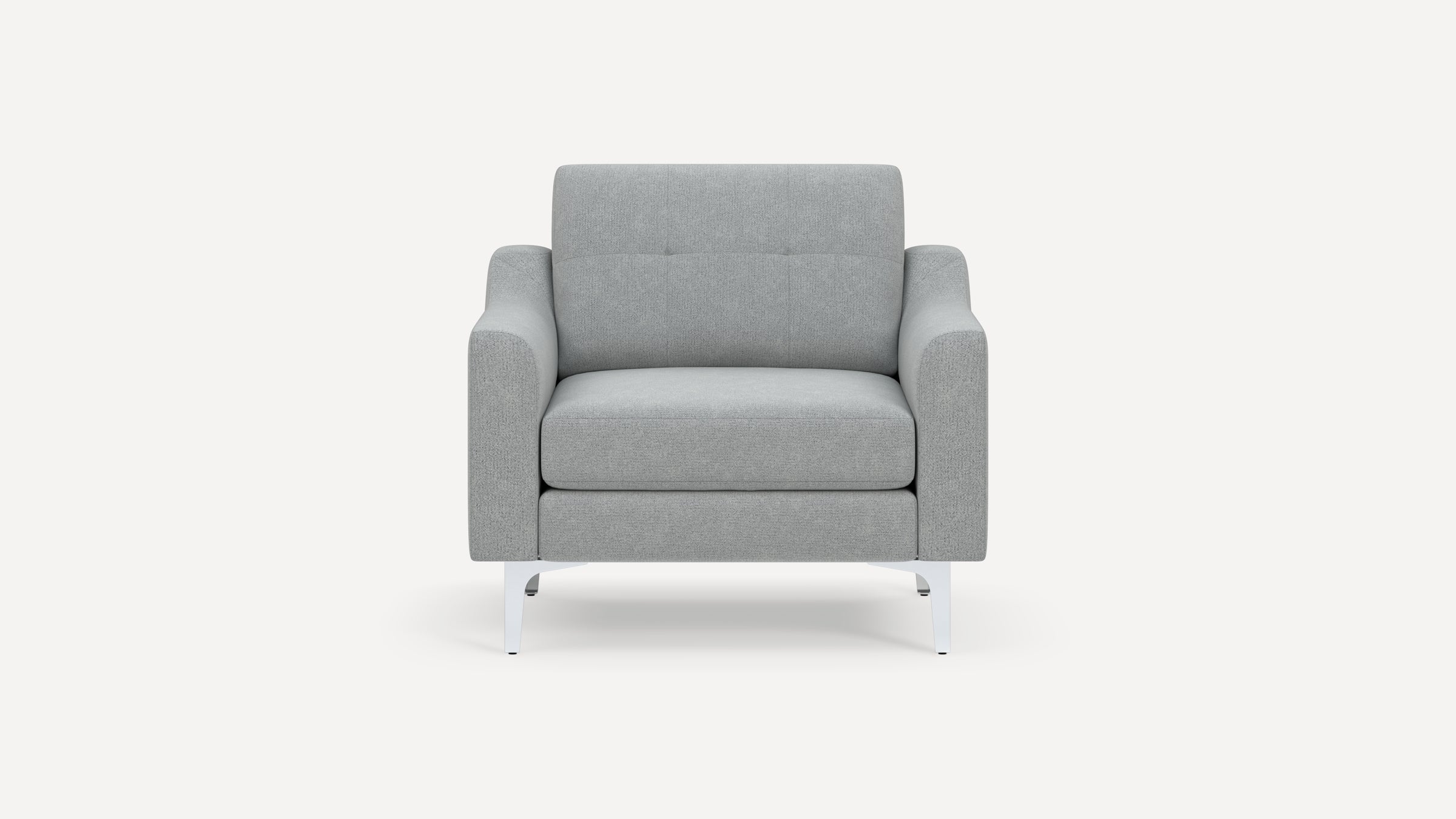 Front view of a modern, light gray fabric armchair with cushioned seat, padded arms, button-tufted backrest, and metal legs.