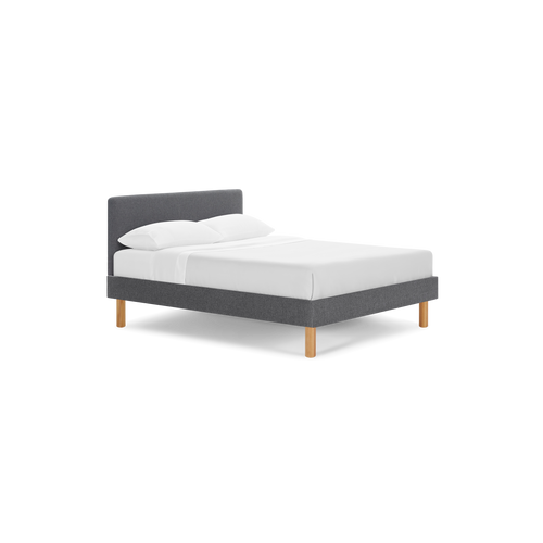 modern gray upholstered bed with wooden legs and white sheets on top of bed, isolated against a black background