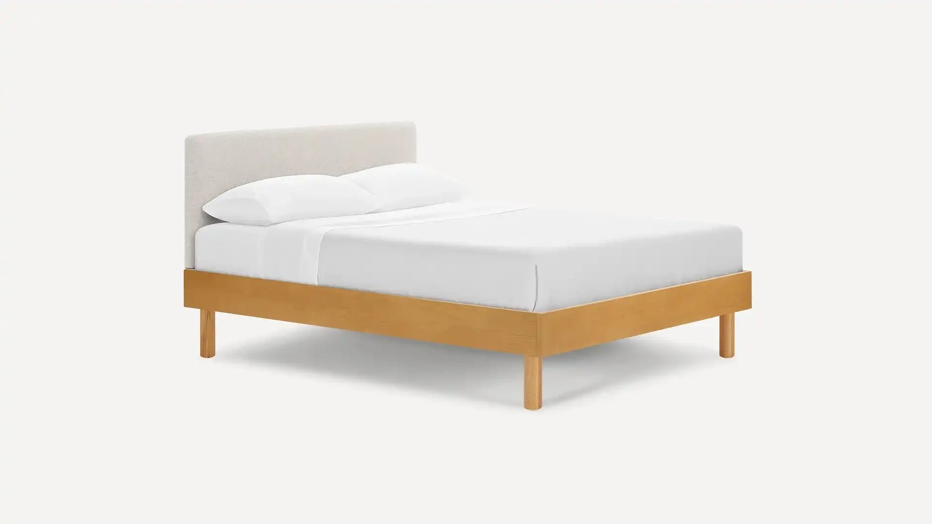 Modern wooden bed frame with light beige upholstered headboard and white bedding, featuring clean minimalist design.