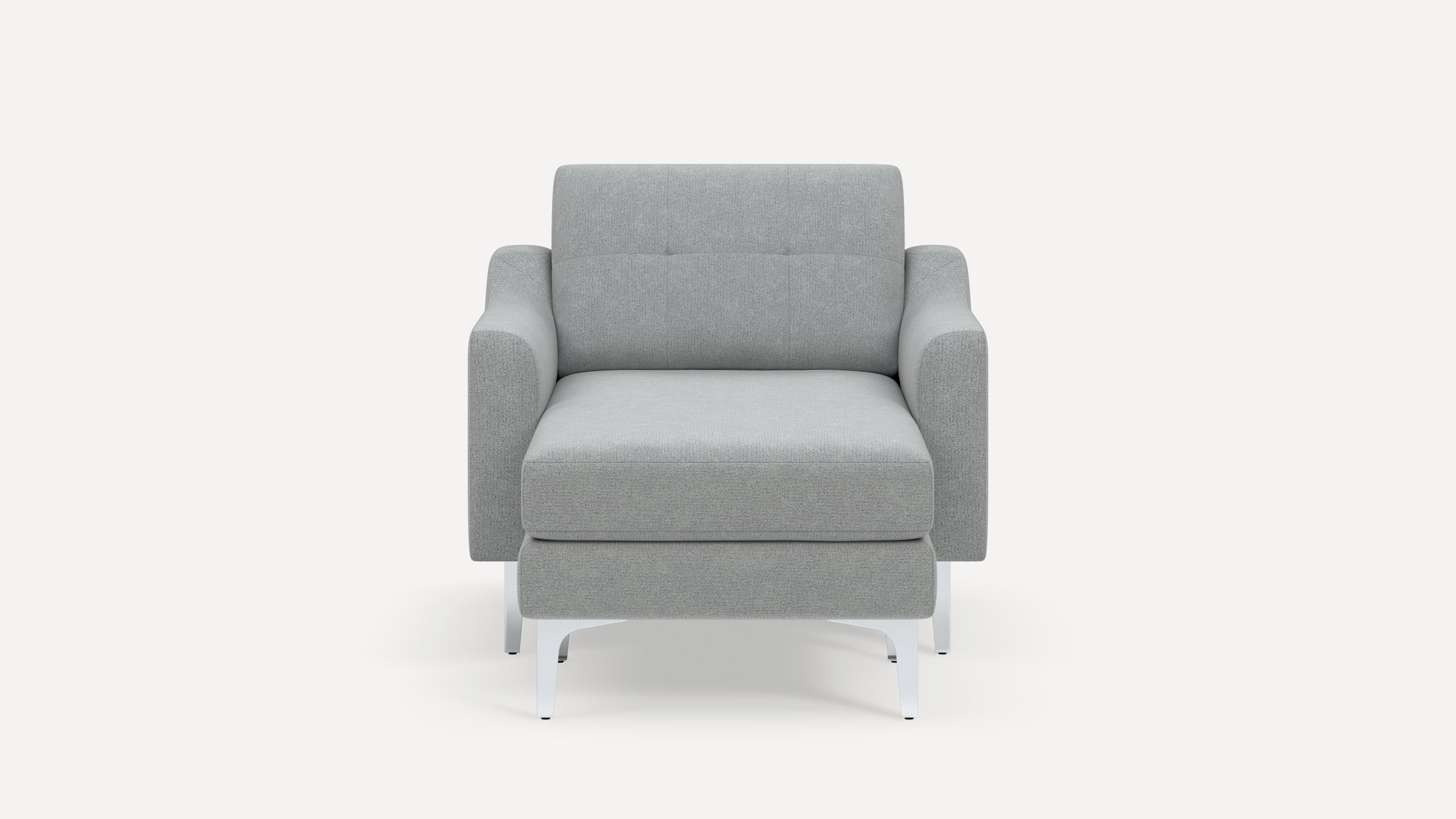 Front view of a modern, light gray upholstered armchair with white metal legs and slightly curved armrests.
