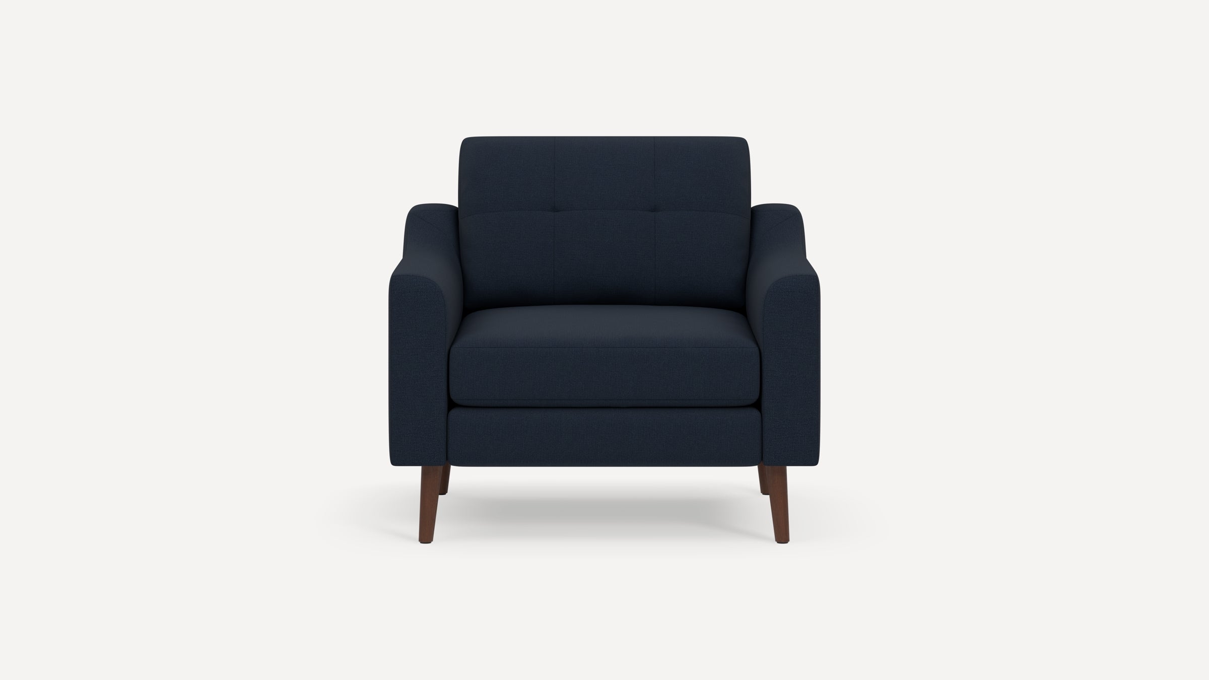 Front view of a modern navy blue upholstered armchair with wooden legs and a cushioned seat and backrest.