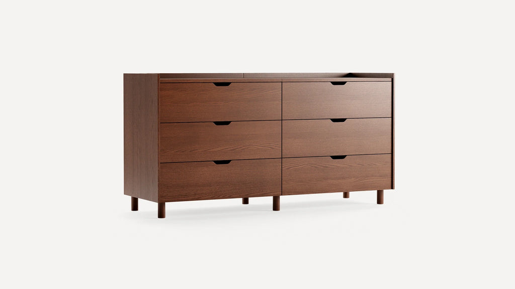 Mid-century modern wooden dresser with six drawers, a warm brown finish, and round legs on a white background.