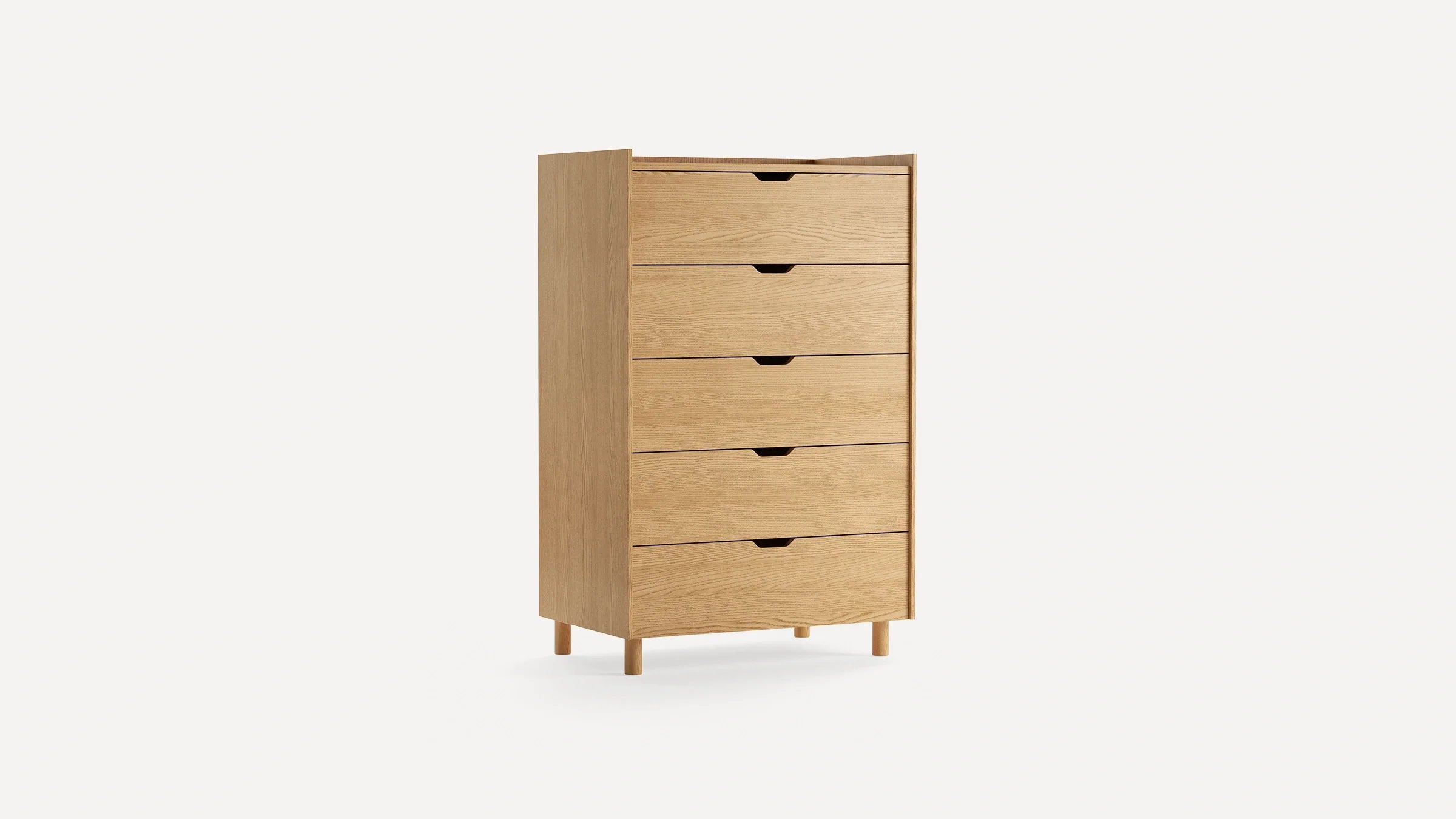 Light wood five-drawer chest with minimalistic design, recessed handles, and elevated round legs on a white background.