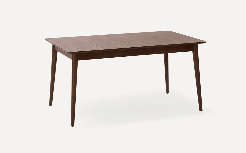 Rectangular wooden dining table with smooth surface and tapered legs, finished in a warm brown tone.