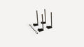 a black metal pole with four black poles