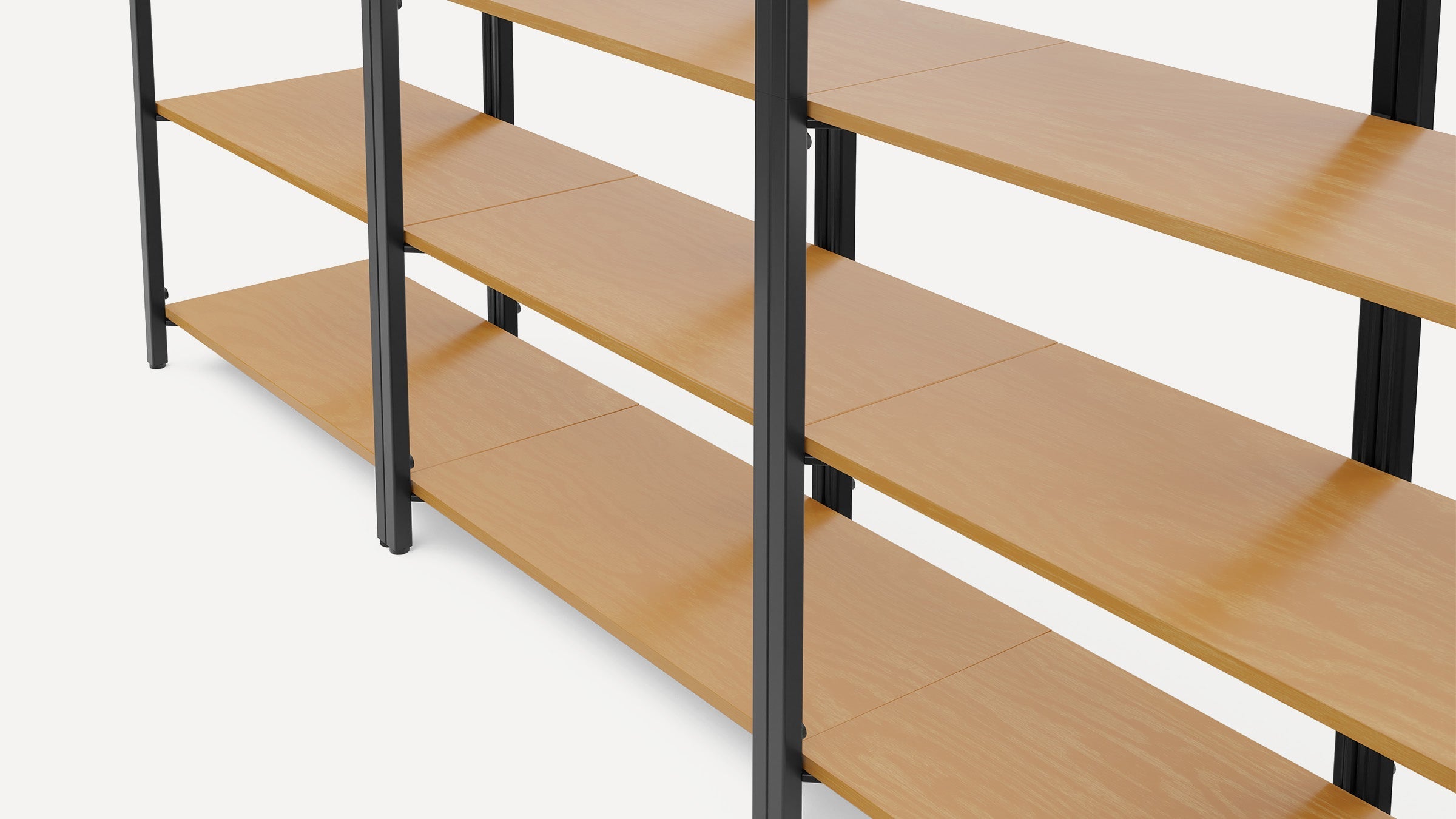 Close-up of a modern shelving unit with light wood shelves supported by a sturdy black metal frame.