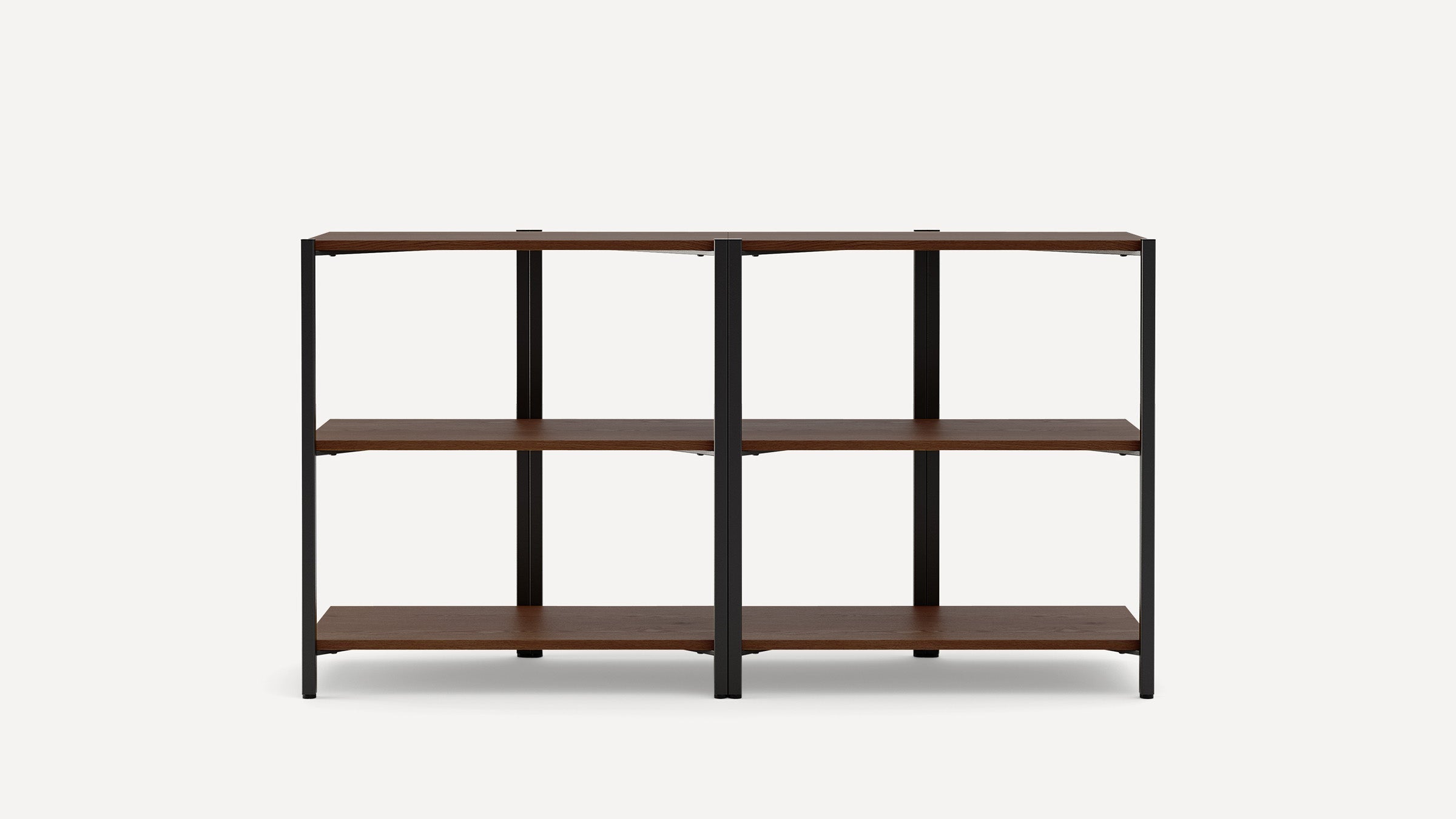 Open shelving unit with two sections, each having three wooden shelves and a black metal frame, minimalist design.