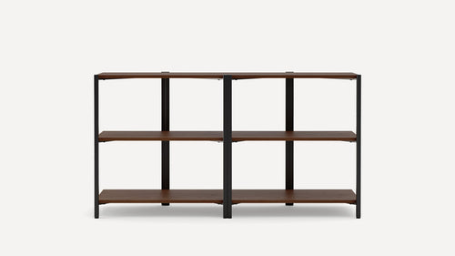 Open shelving unit with two sections, each having three wooden shelves and a black metal frame, minimalist design.