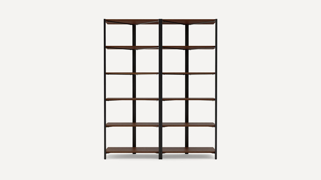 Double-sided bookshelf with five wooden shelves and a black metal frame, designed for corner placement and maximum storage.