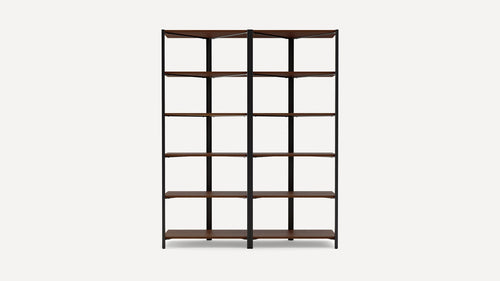 Double-sided bookshelf with five wooden shelves and a black metal frame, designed for corner placement and maximum storage.