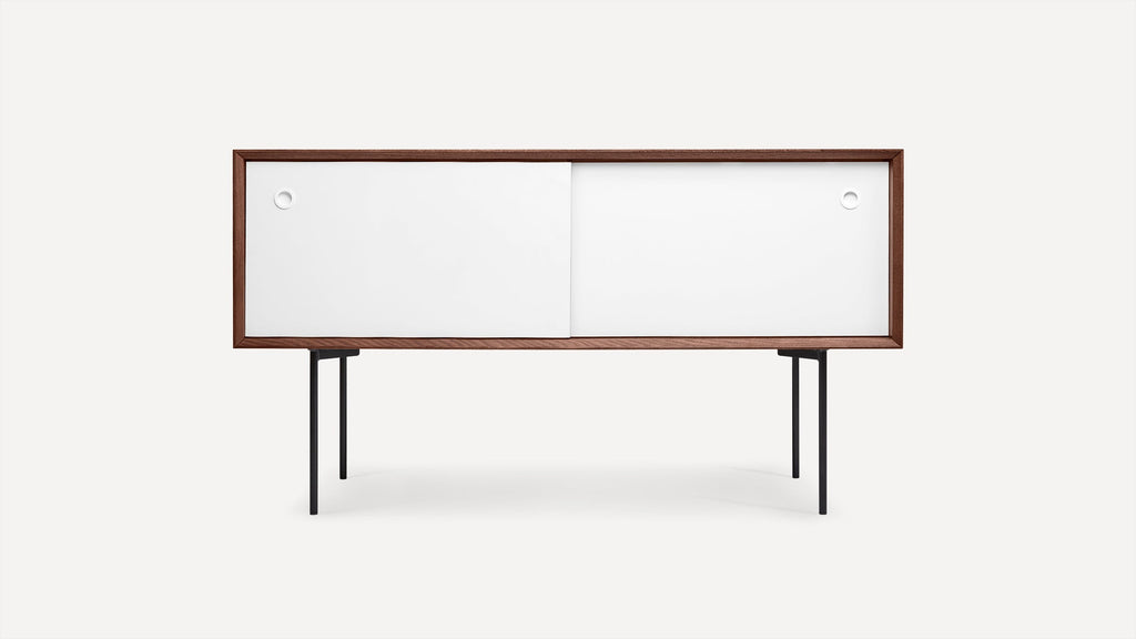 Modern sideboard with white sliding doors, walnut frame, and black metal legs, minimalist and sleek design.