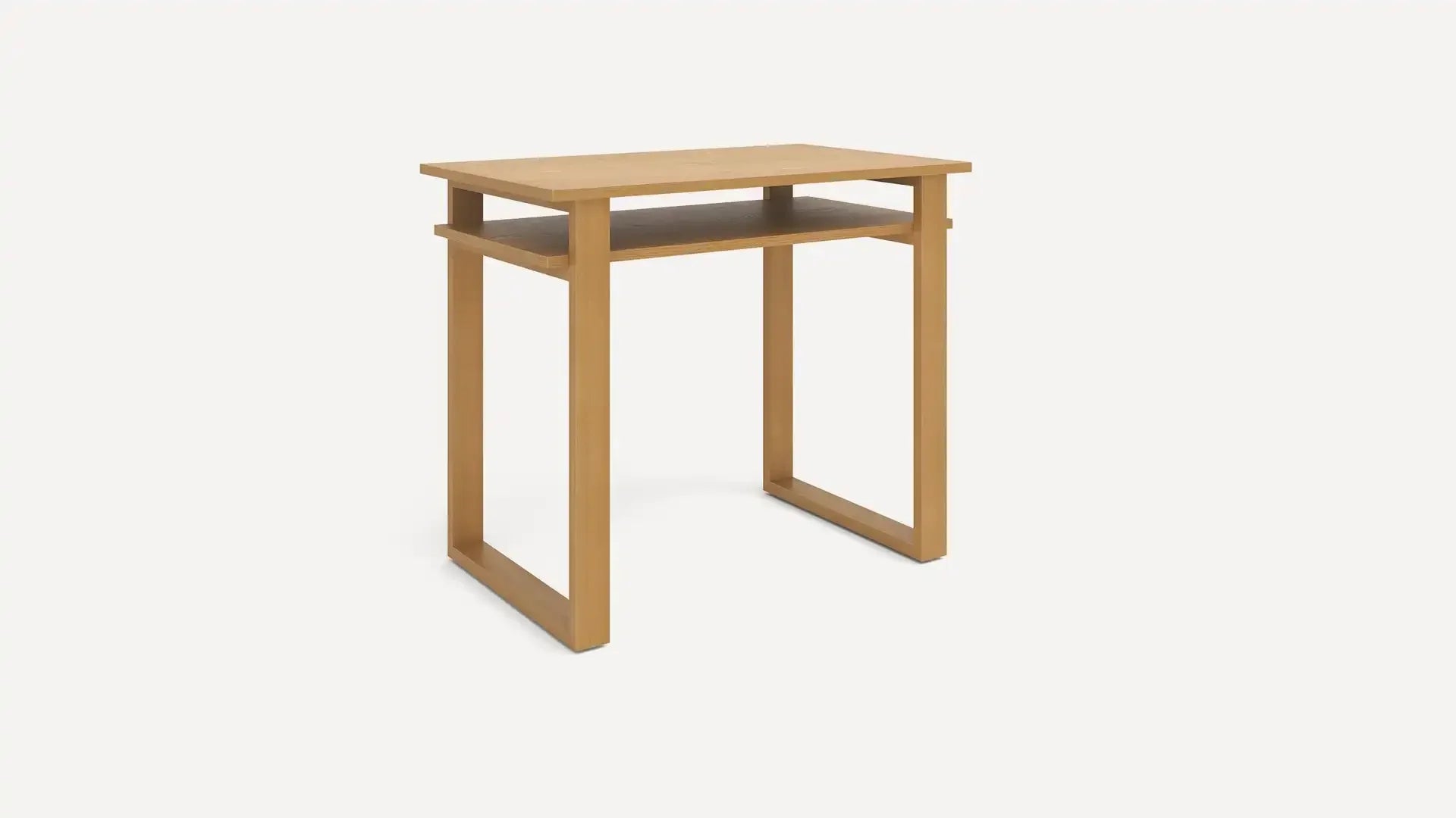 Modern light wood desk with flat top surface and an open shelf underneath, supported by geometric square legs.