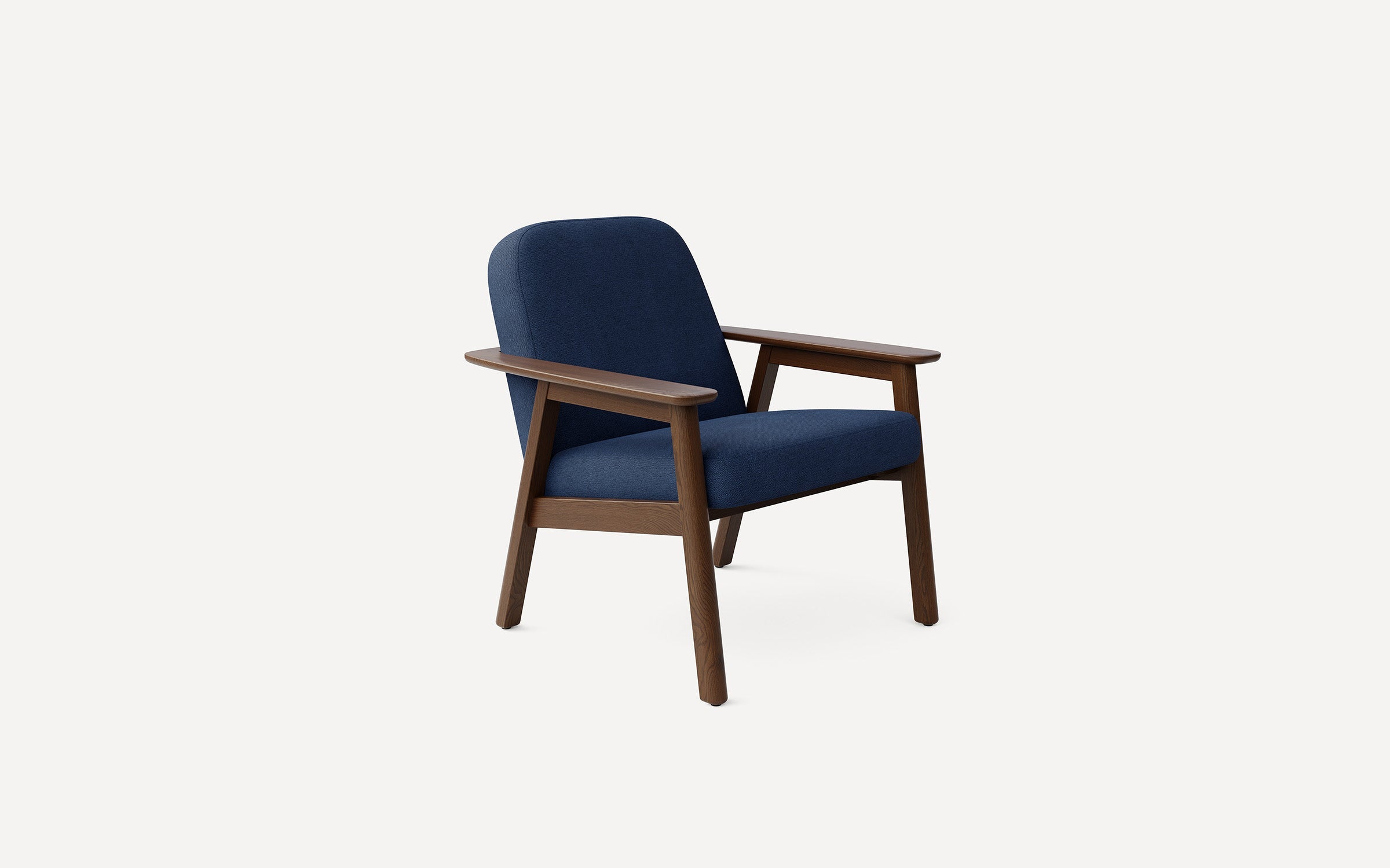 Mid-century modern armchair with dark blue upholstered cushions and wooden frame and armrests, angled for comfort.