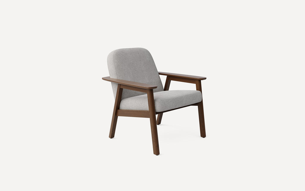 Mid-century modern lounge chair with light gray upholstered seat and backrest, featuring dark wooden armrests and legs.