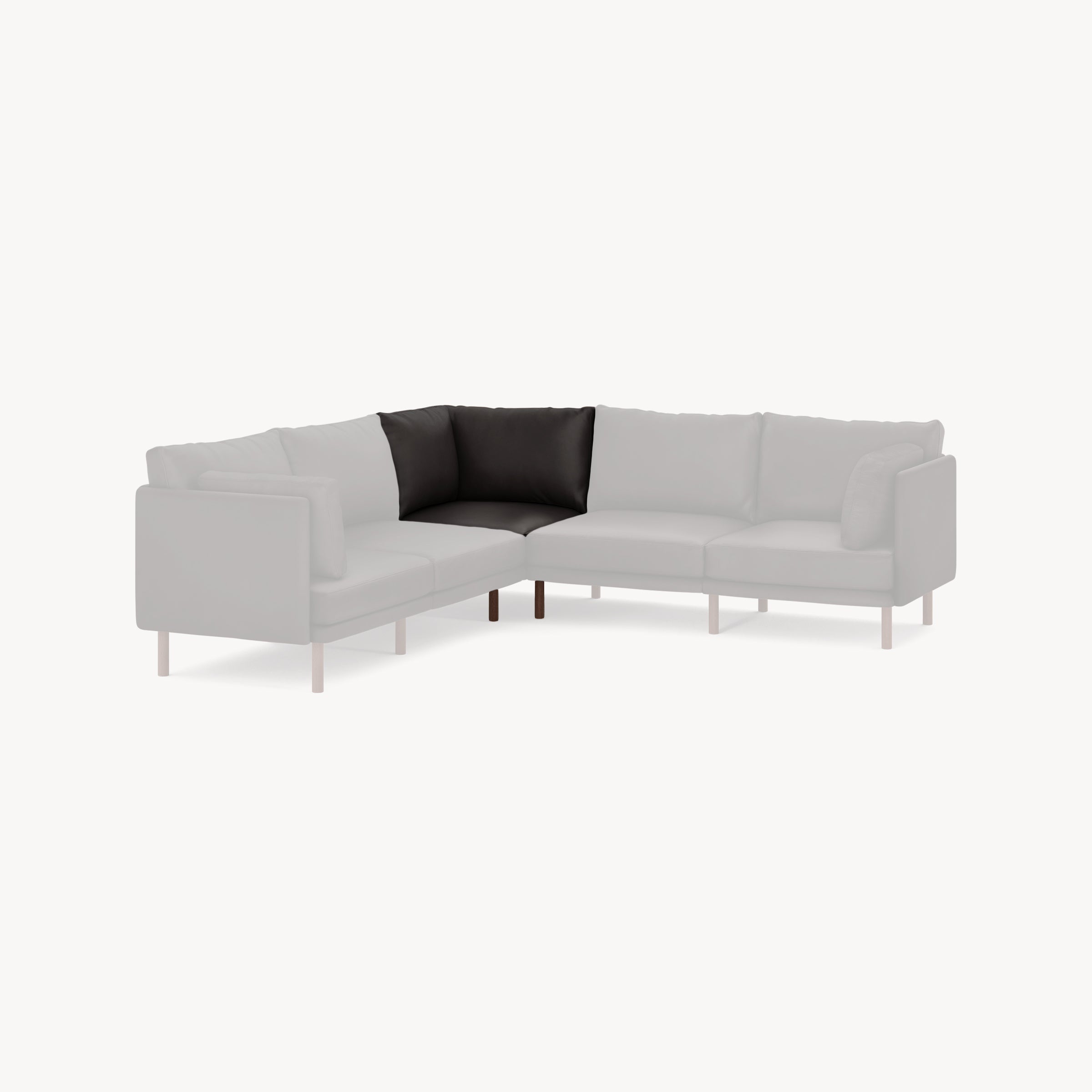 Modern sectional corner sofa piece in dark grey upholstery with wooden legs, shown isolated on white background.