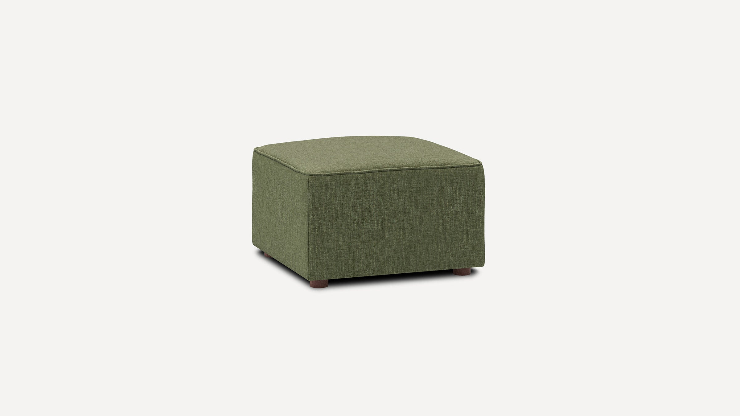 Square olive green fabric ottoman with rounded edges and short wooden legs on white background.