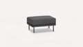 Dark gray modern rectangular ottoman with fabric upholstery and four metal legs on a white background.