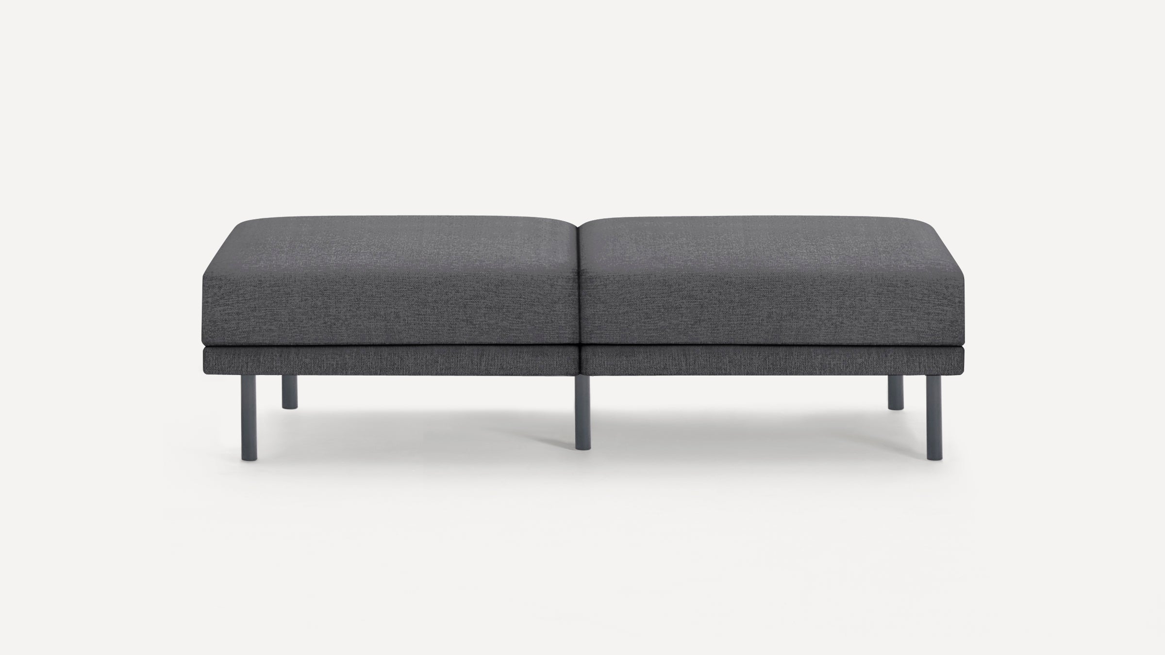 Modern dark gray fabric bench with rectangular cushion and five sturdy cylindrical legs, minimalist design on white background.