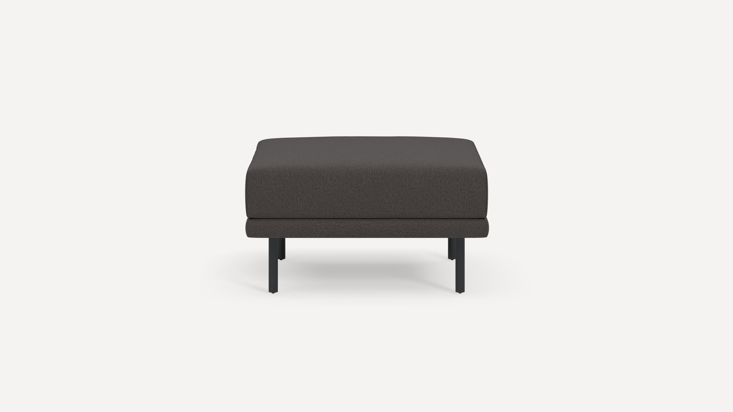 Square dark gray fabric ottoman with black metal legs, minimalist modern design, isolated on white background.