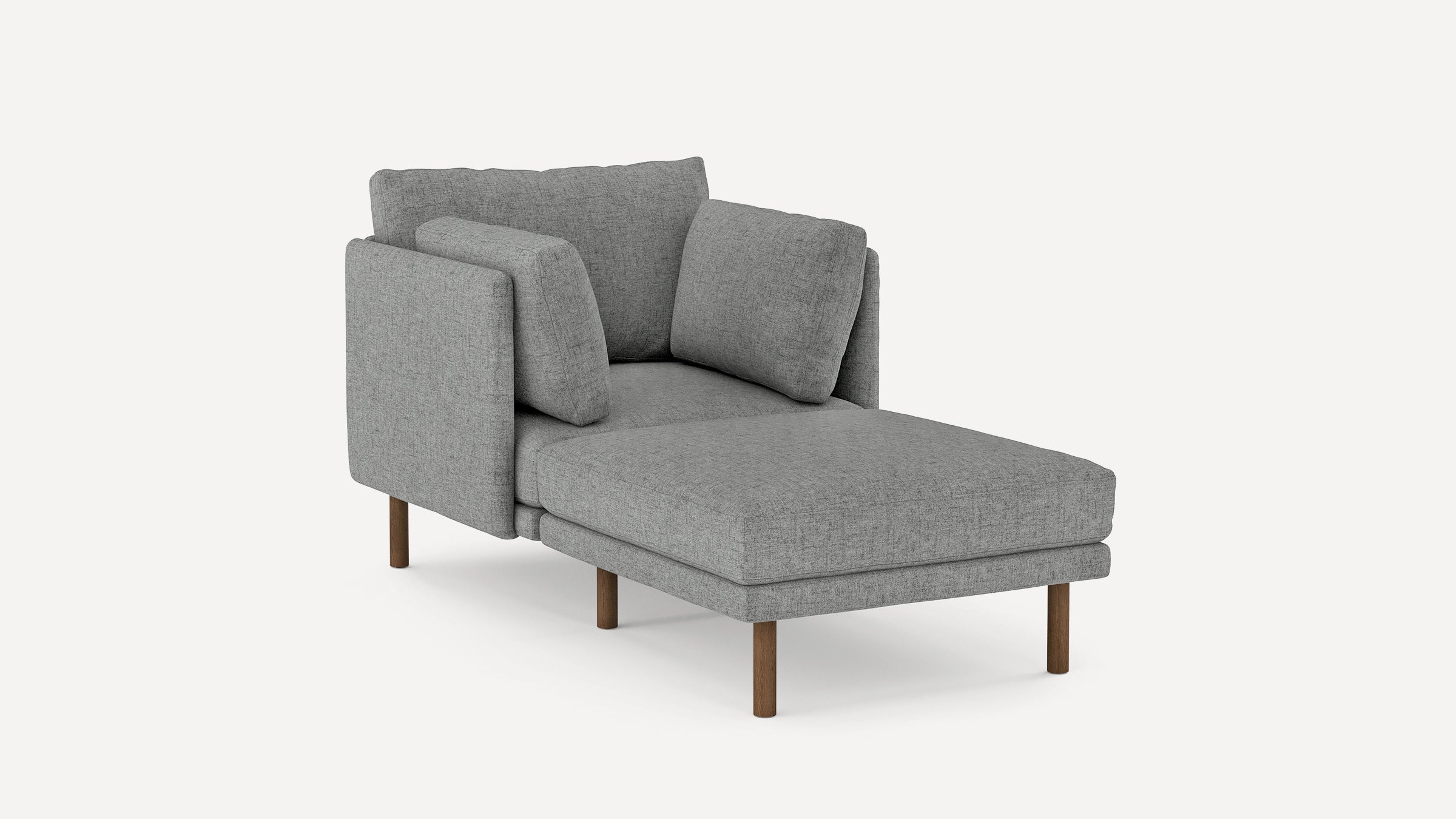 Gray upholstered chaise lounge with wooden legs and three matching cushions, modern and minimalist design.